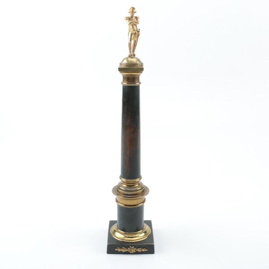 Metal Figurine of a Man atop Wood and Metal Trophy