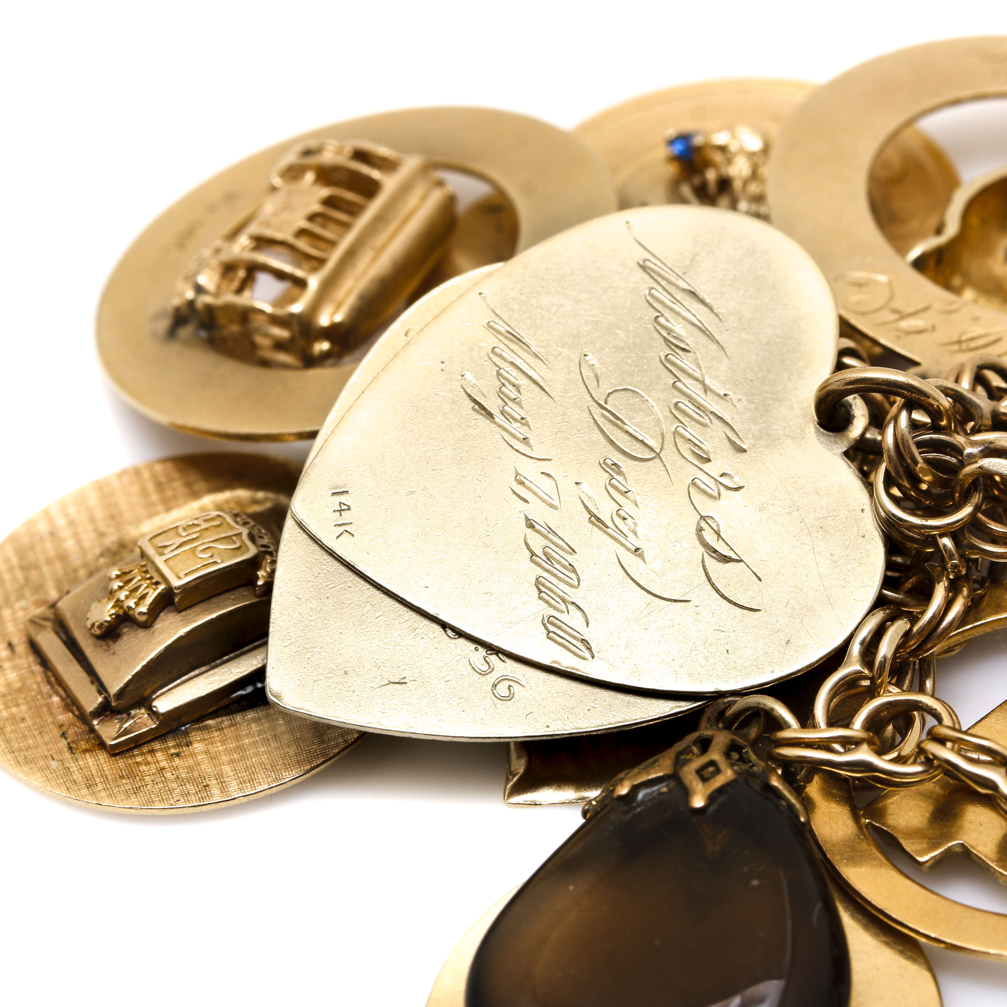 14K Yellow Gold Synthetic Spinel, Synthetic Ruby, and Gemstone Charm Bracelet