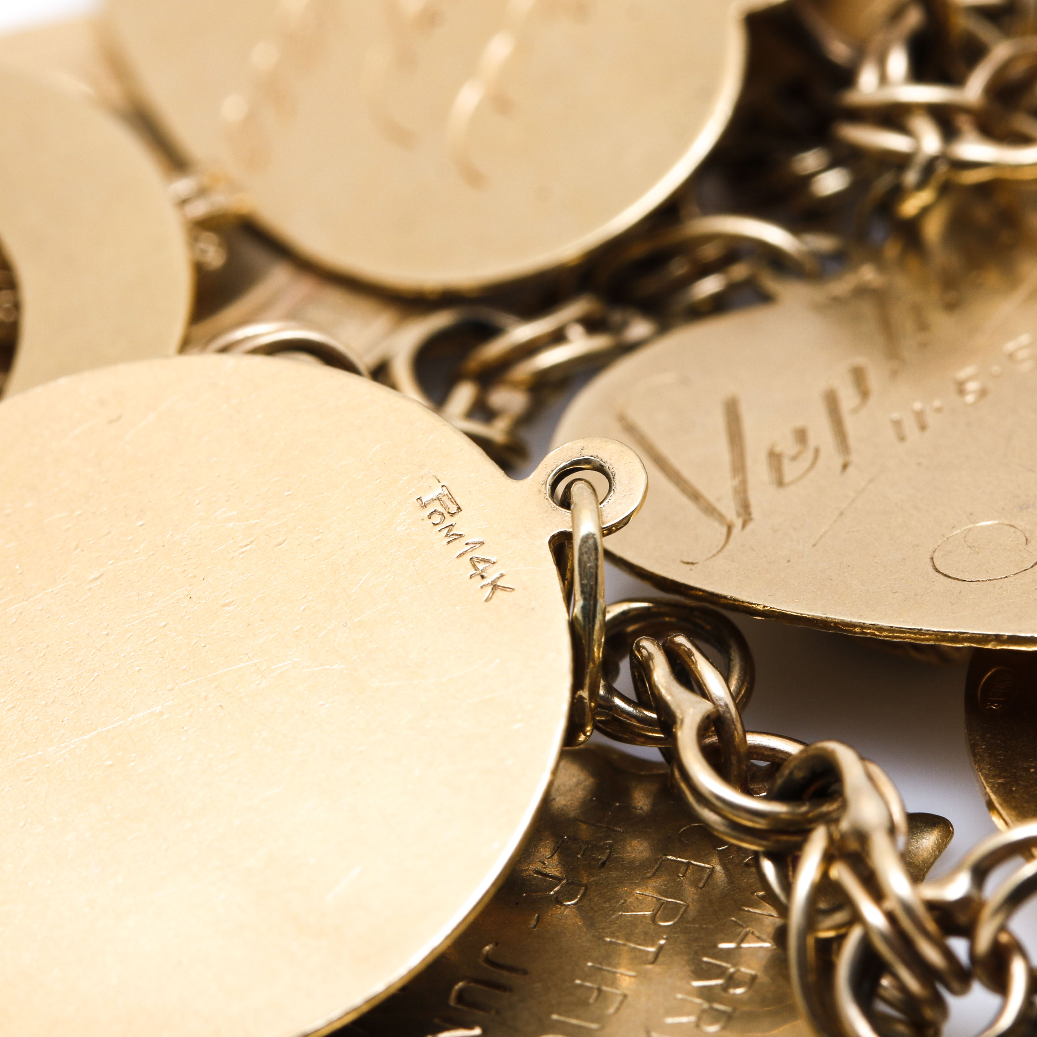 14K Yellow Gold Synthetic Spinel, Synthetic Ruby, and Gemstone Charm Bracelet
