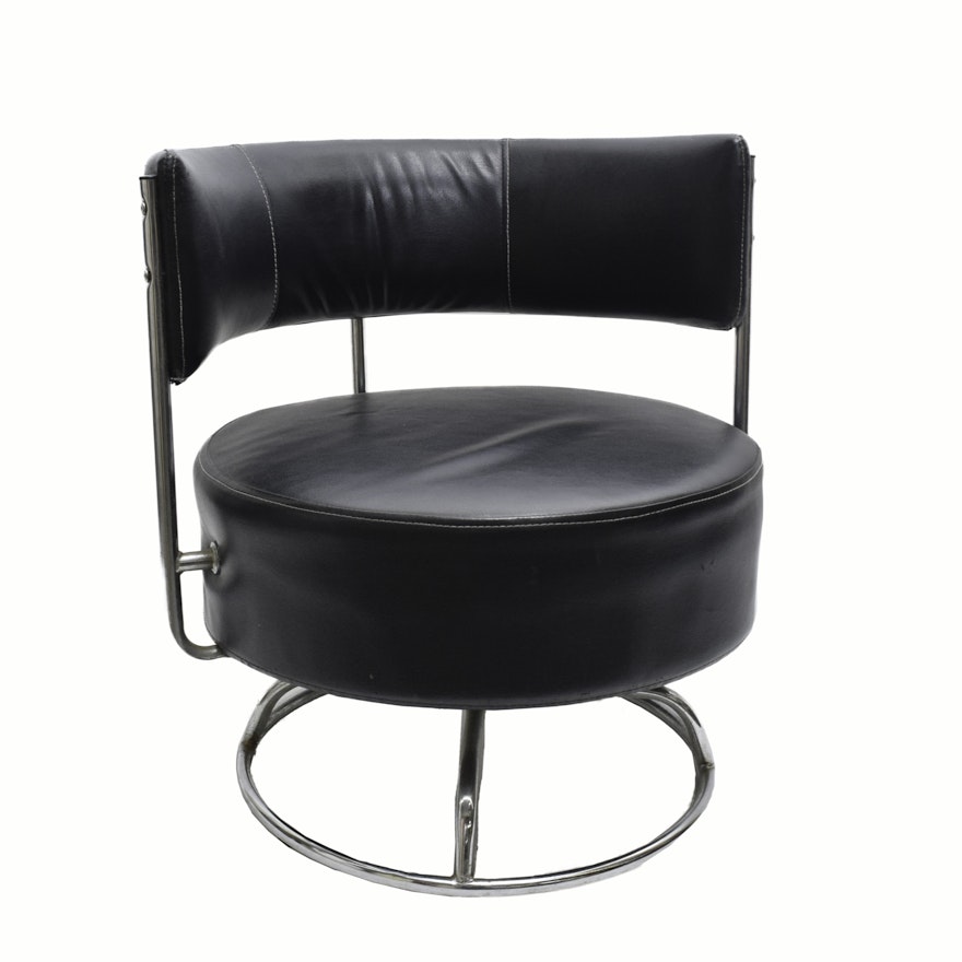Mid Century Modern Chrome and Faux Leather Swivel Chair