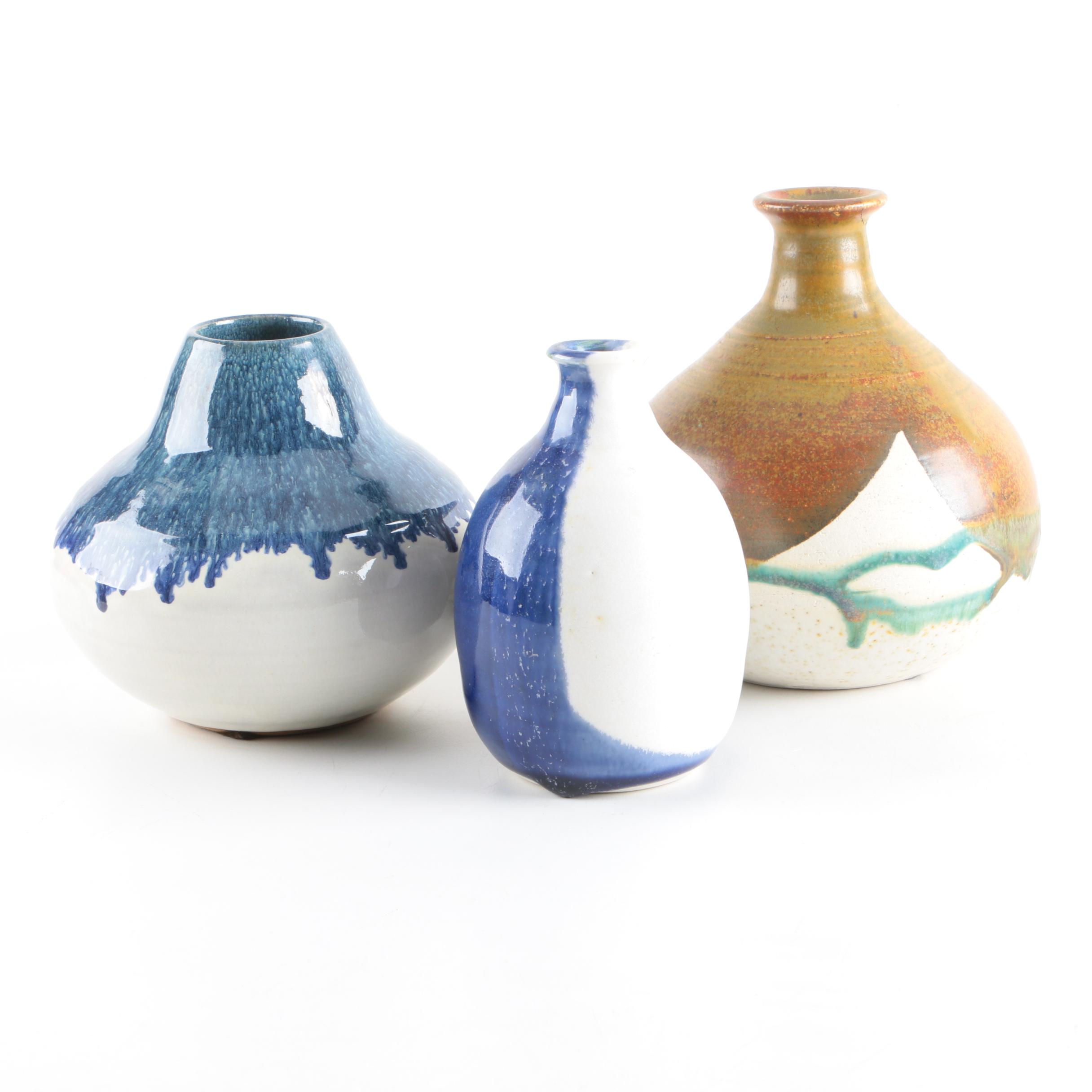 Art Pottery Bottles and a Vase