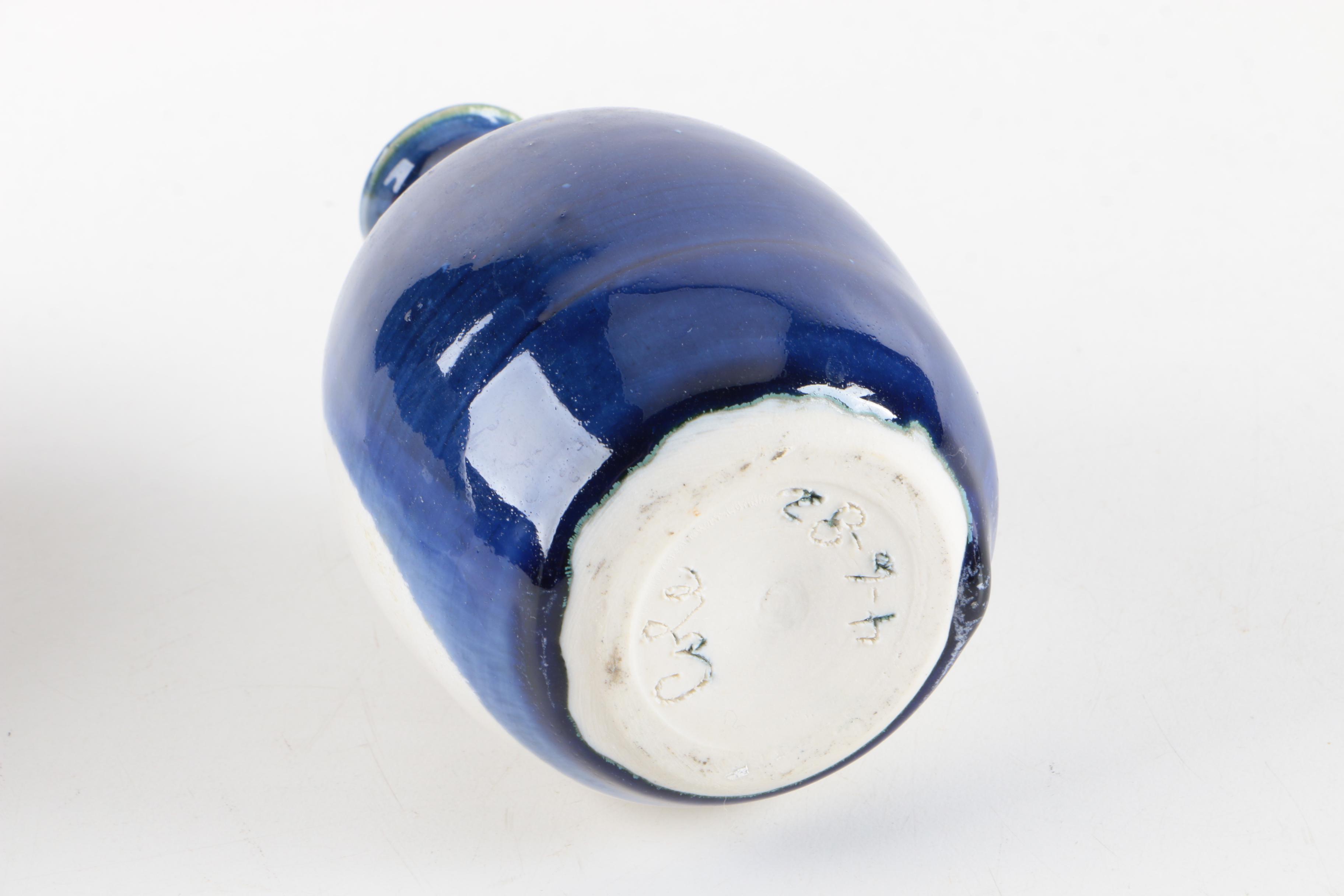 Art Pottery Bottles and a Vase