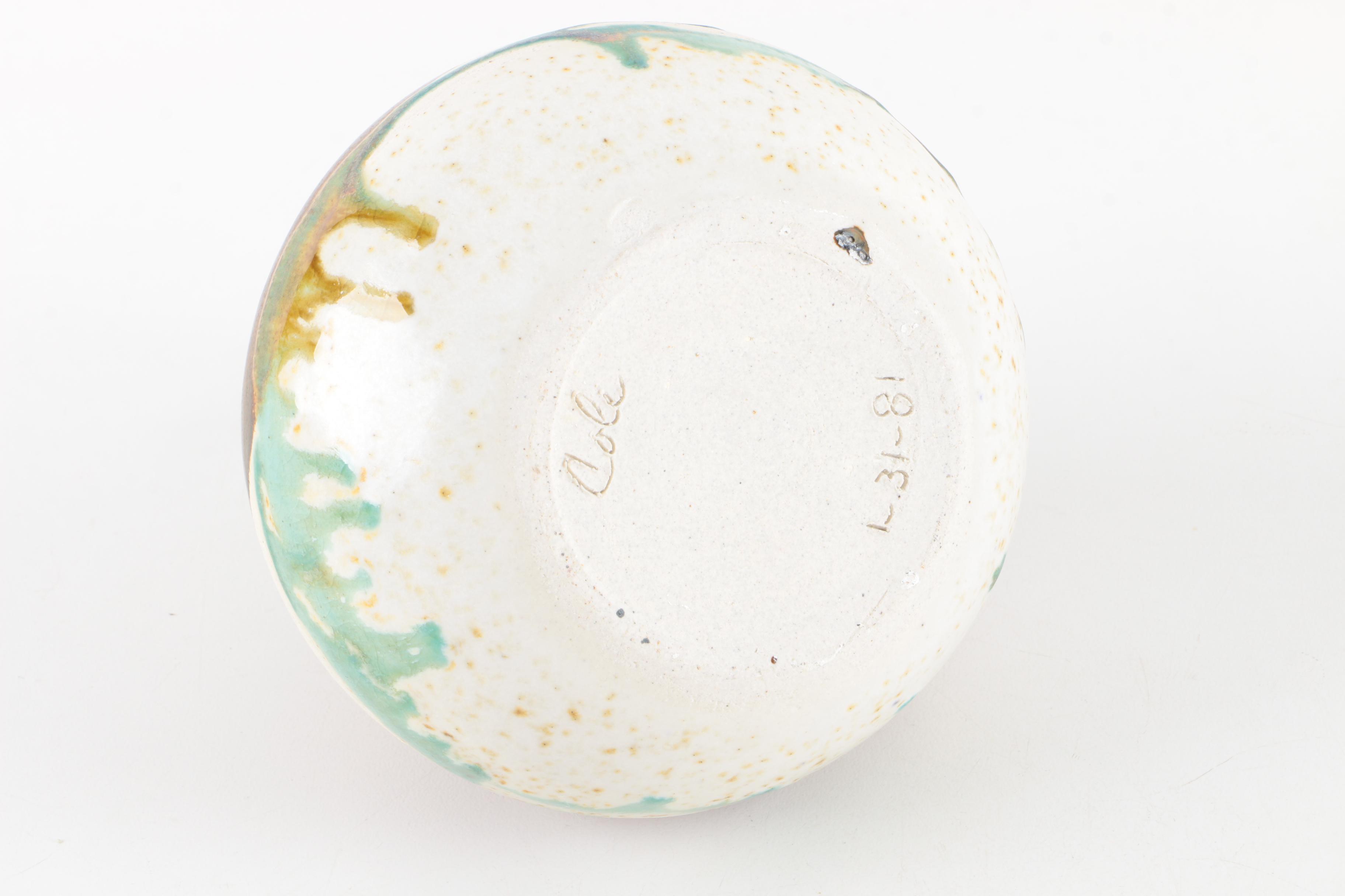 Art Pottery Bottles and a Vase