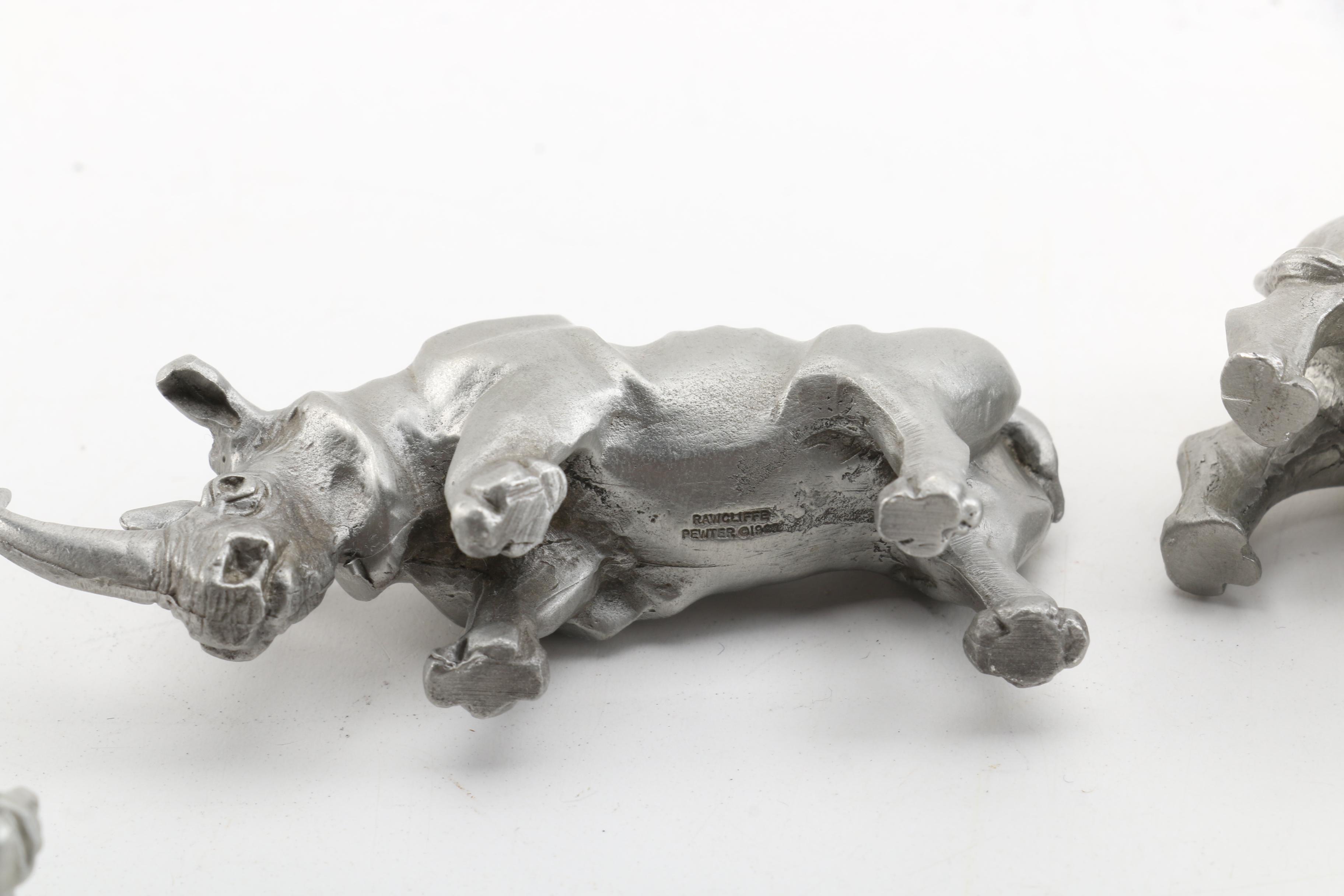 Collection of Three Pewter Rhino Figurines