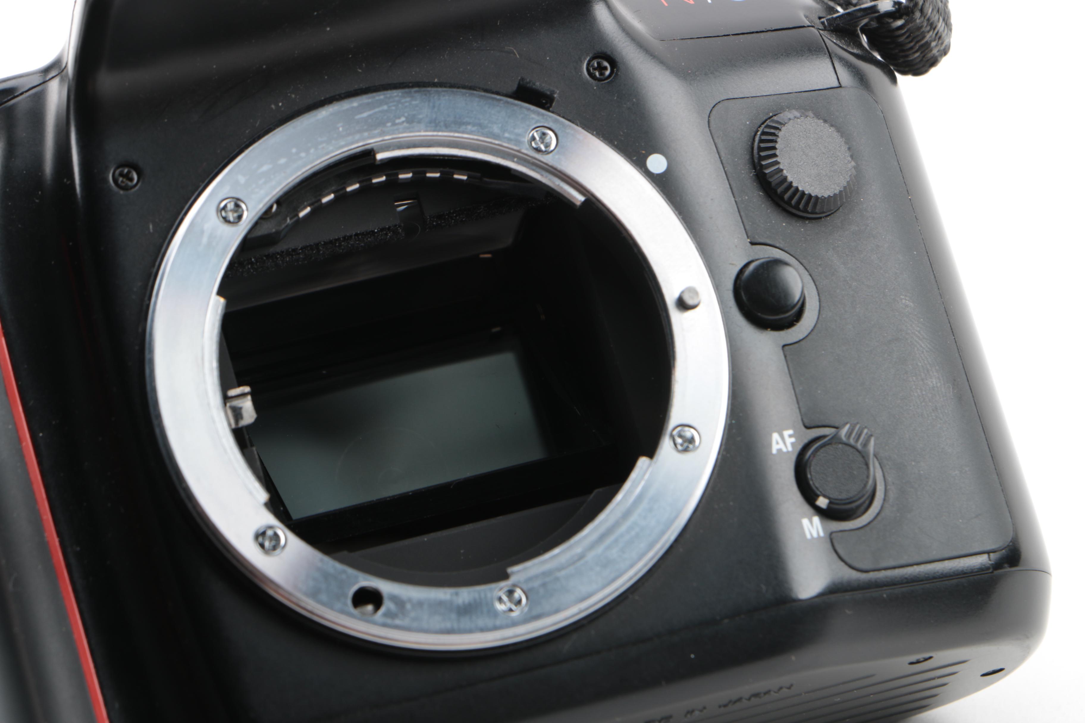 Nikon N70 Still Camera with Macro Speed Light and Cases