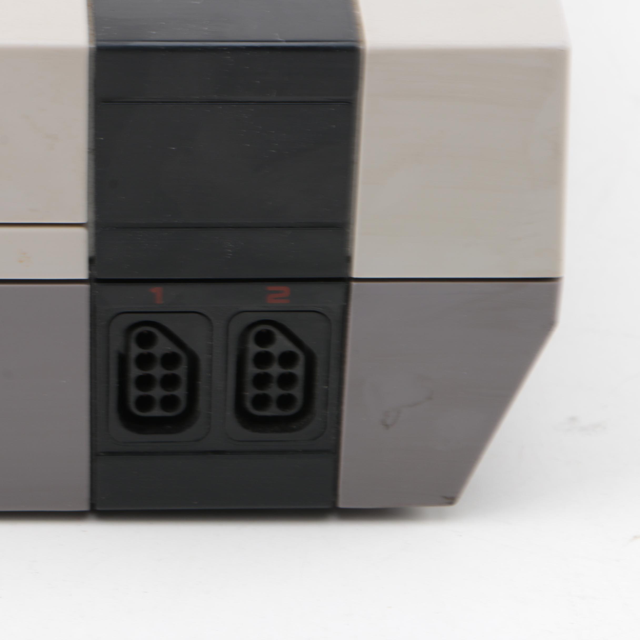 Vintage Nintendo Entertainment System with Games and Accessories