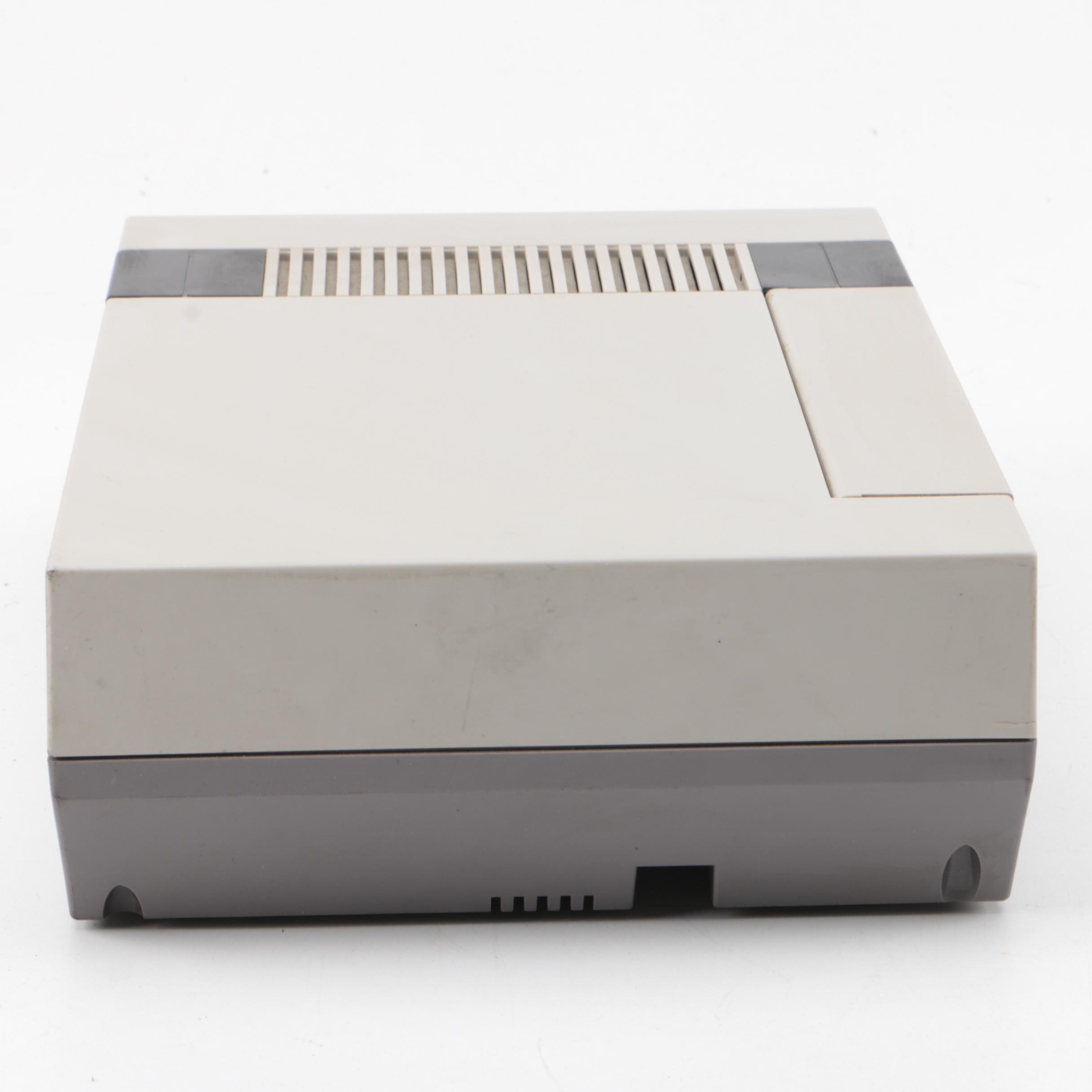 Vintage Nintendo Entertainment System with Games and Accessories