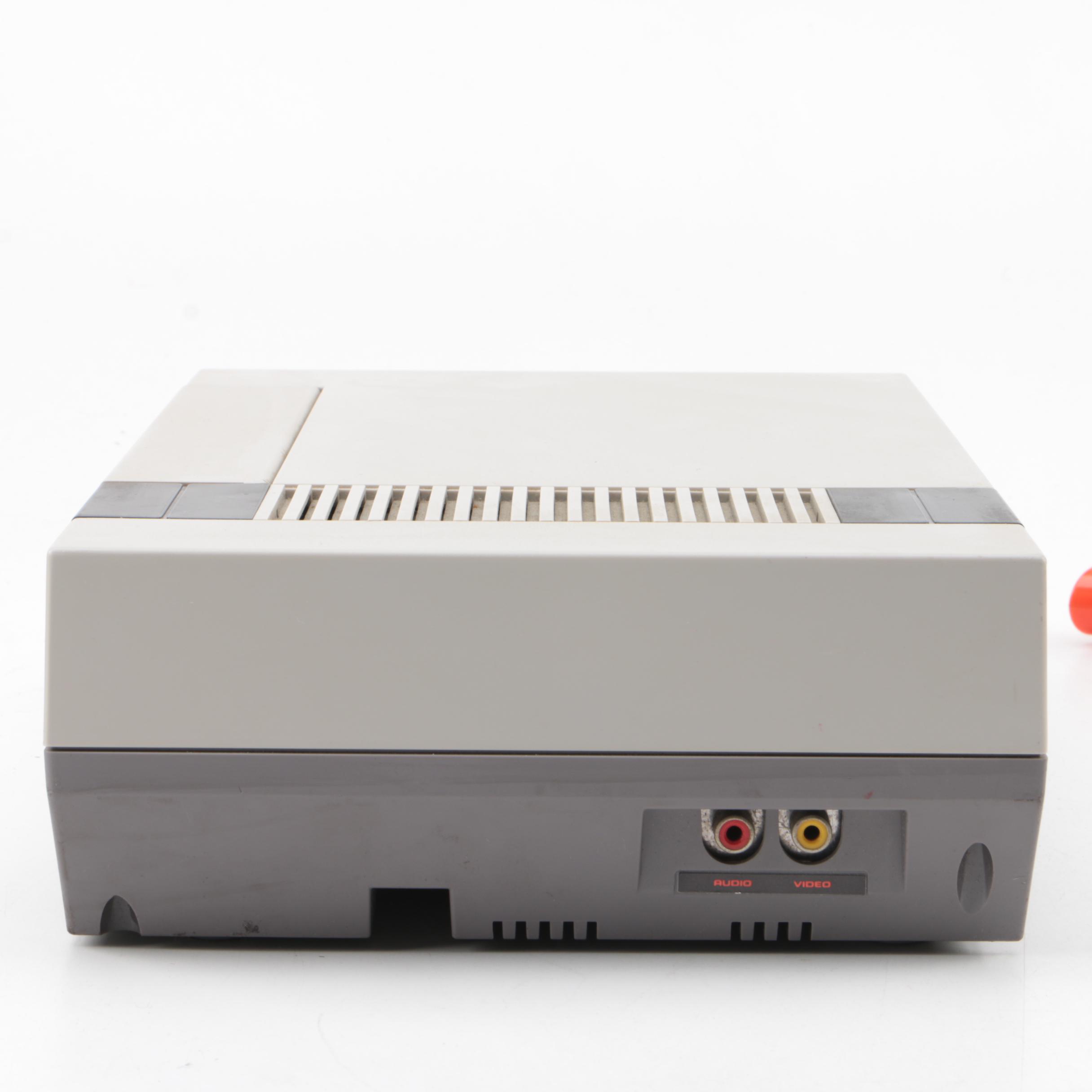 Vintage Nintendo Entertainment System with Games and Accessories