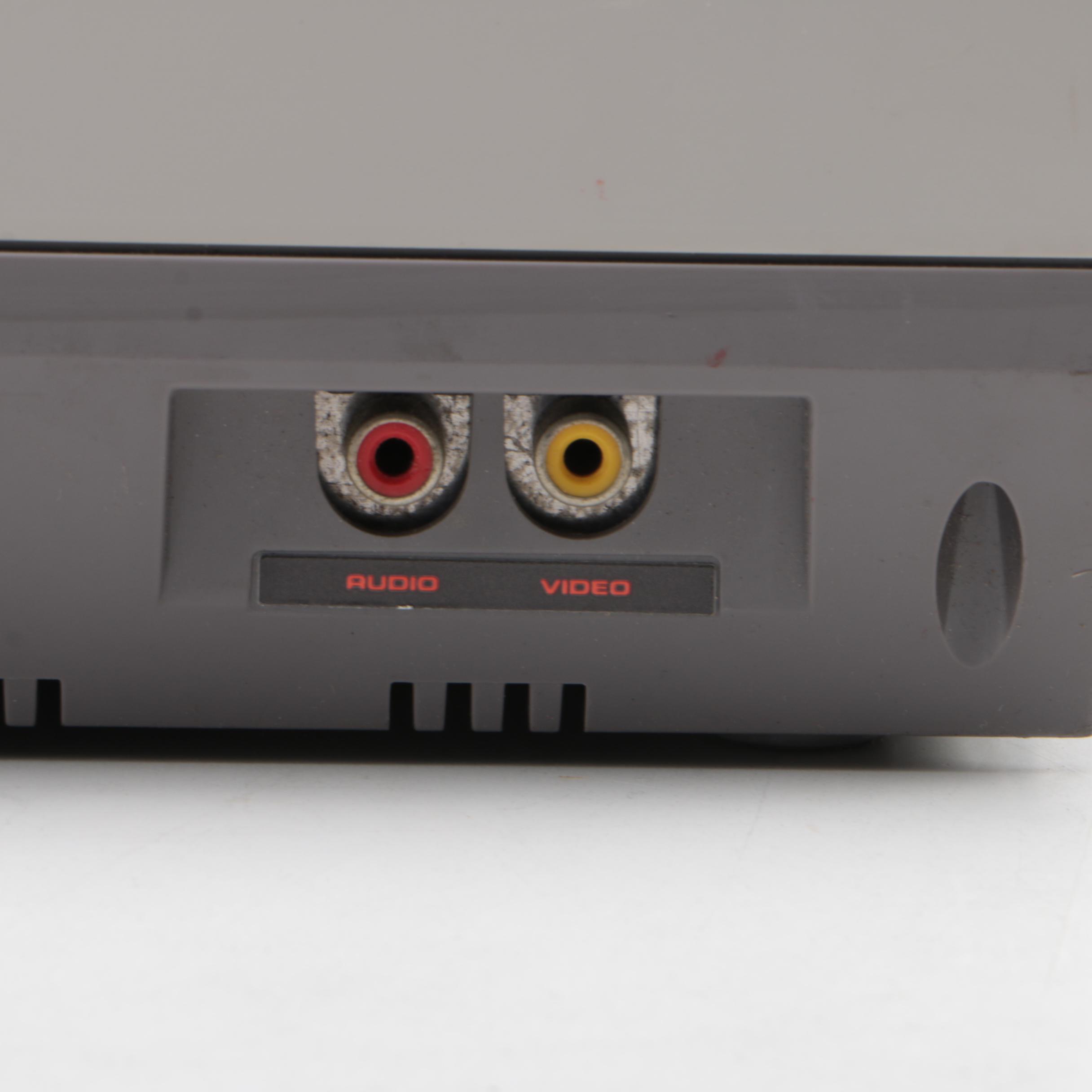 Vintage Nintendo Entertainment System with Games and Accessories