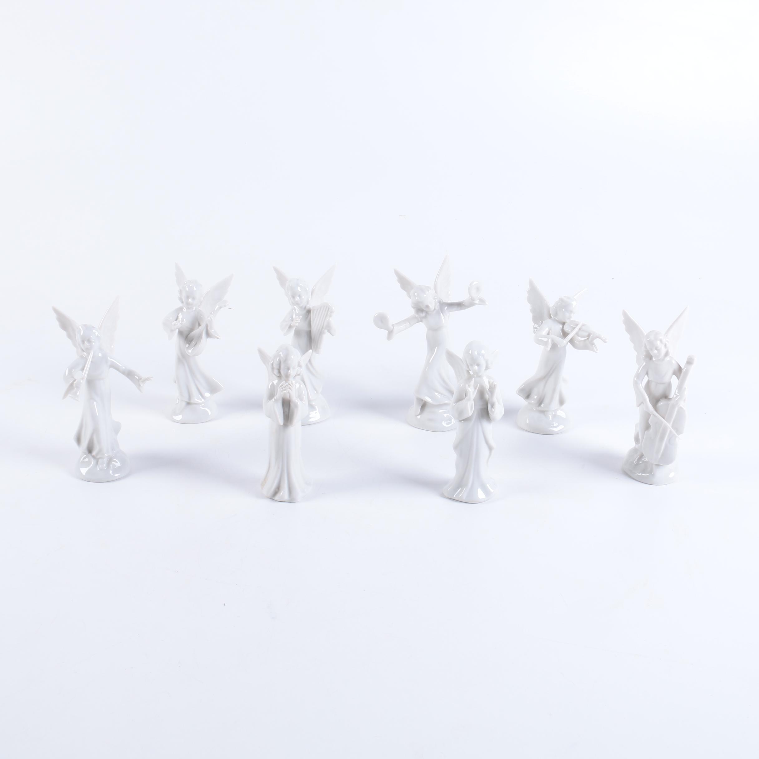 Collection of Eight Dresden Angel Figurines