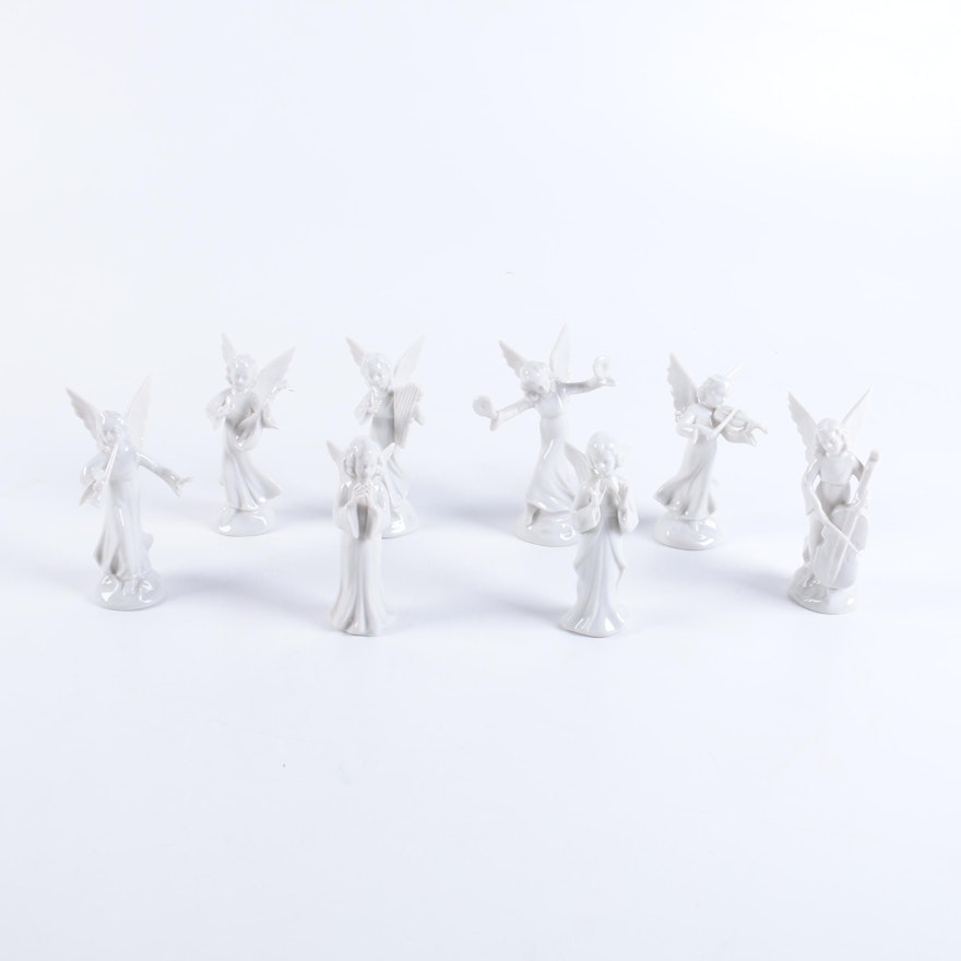 Collection of Eight Dresden Angel Figurines