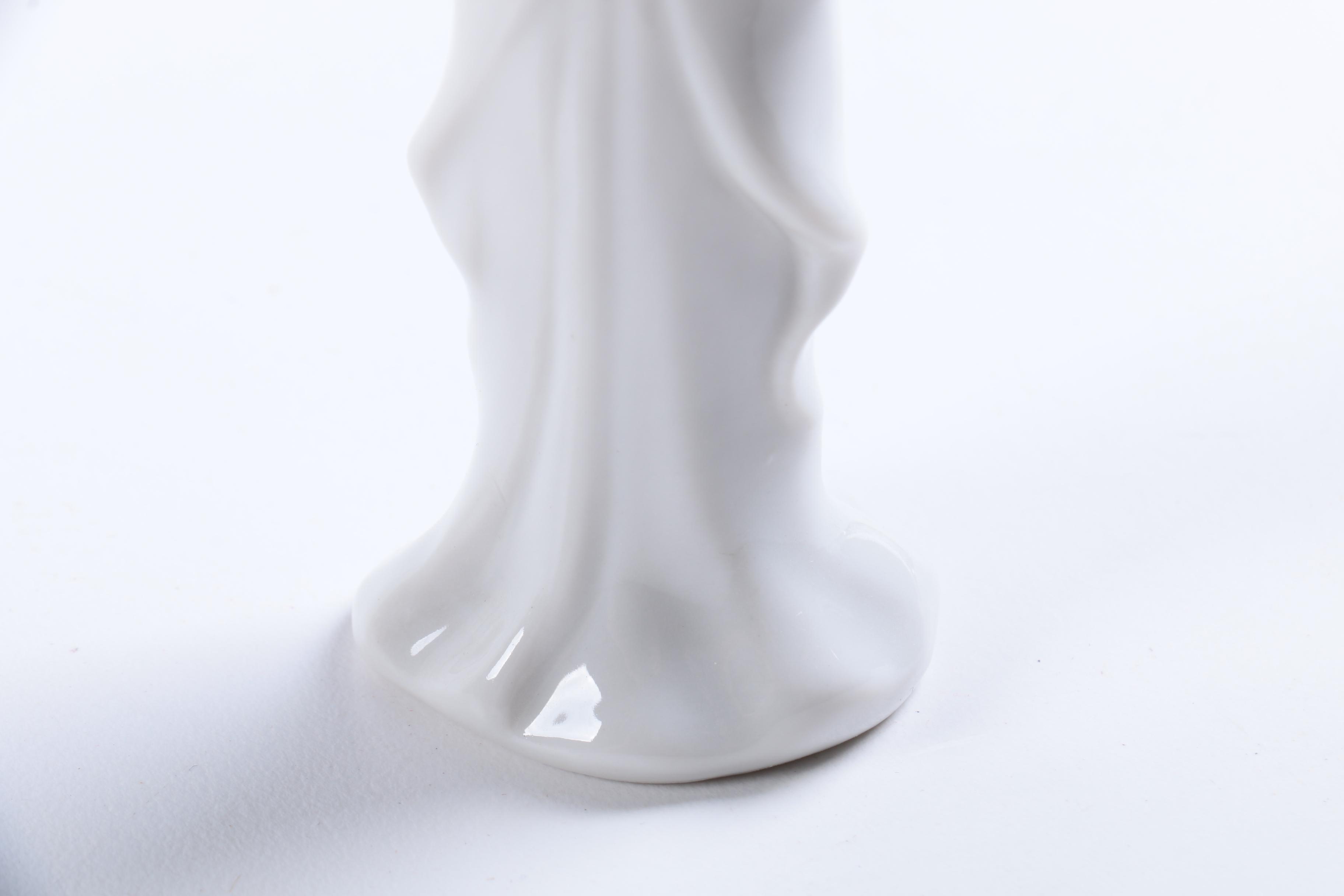 Collection of Eight Dresden Angel Figurines