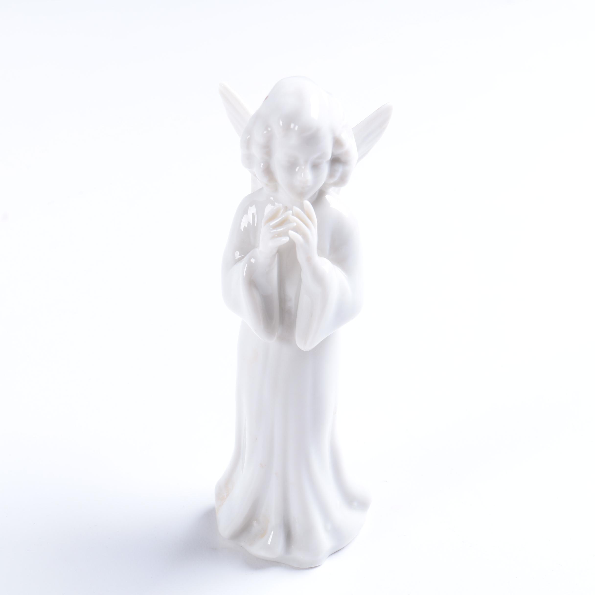 Collection of Eight Dresden Angel Figurines