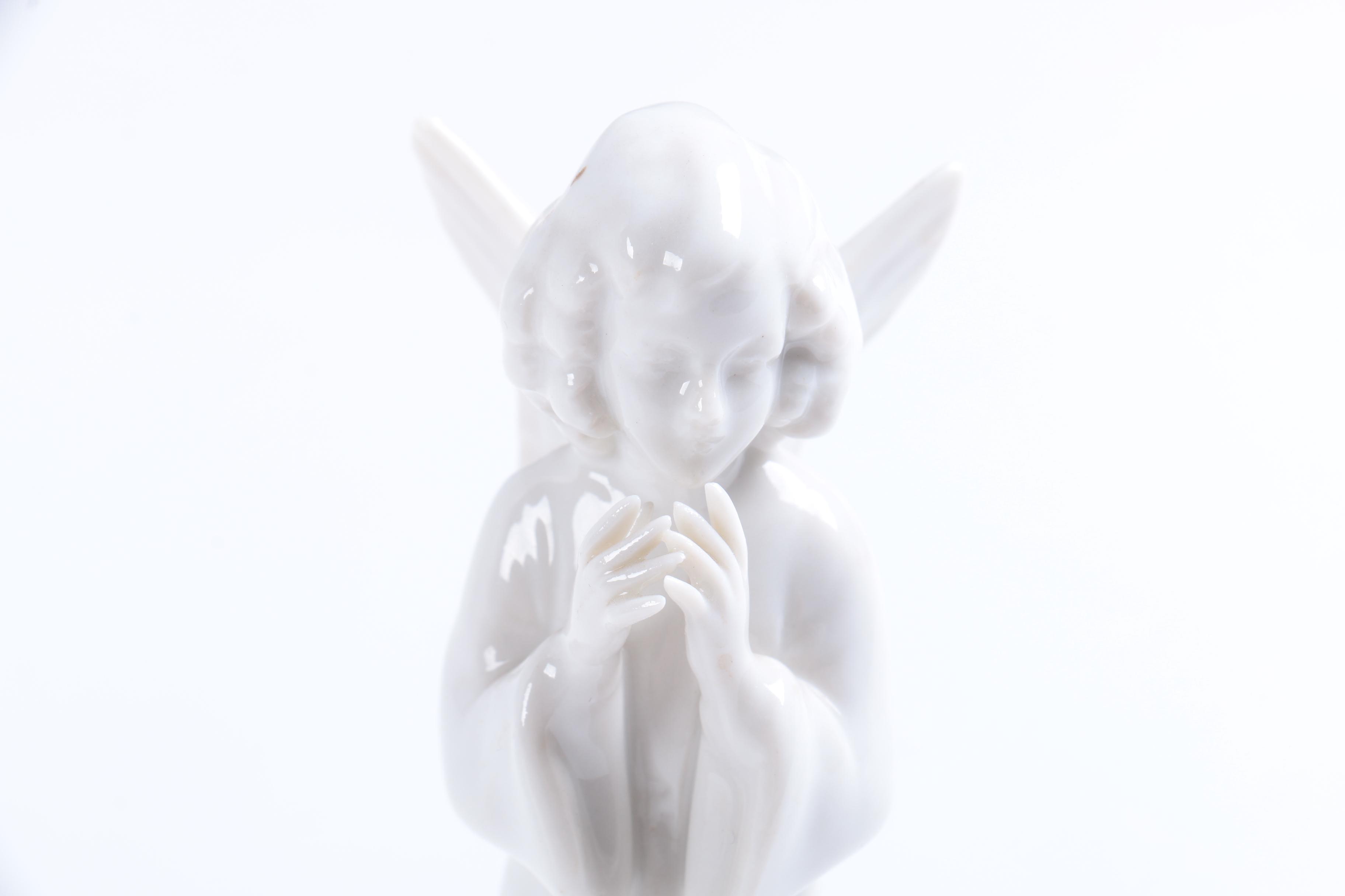 Collection of Eight Dresden Angel Figurines