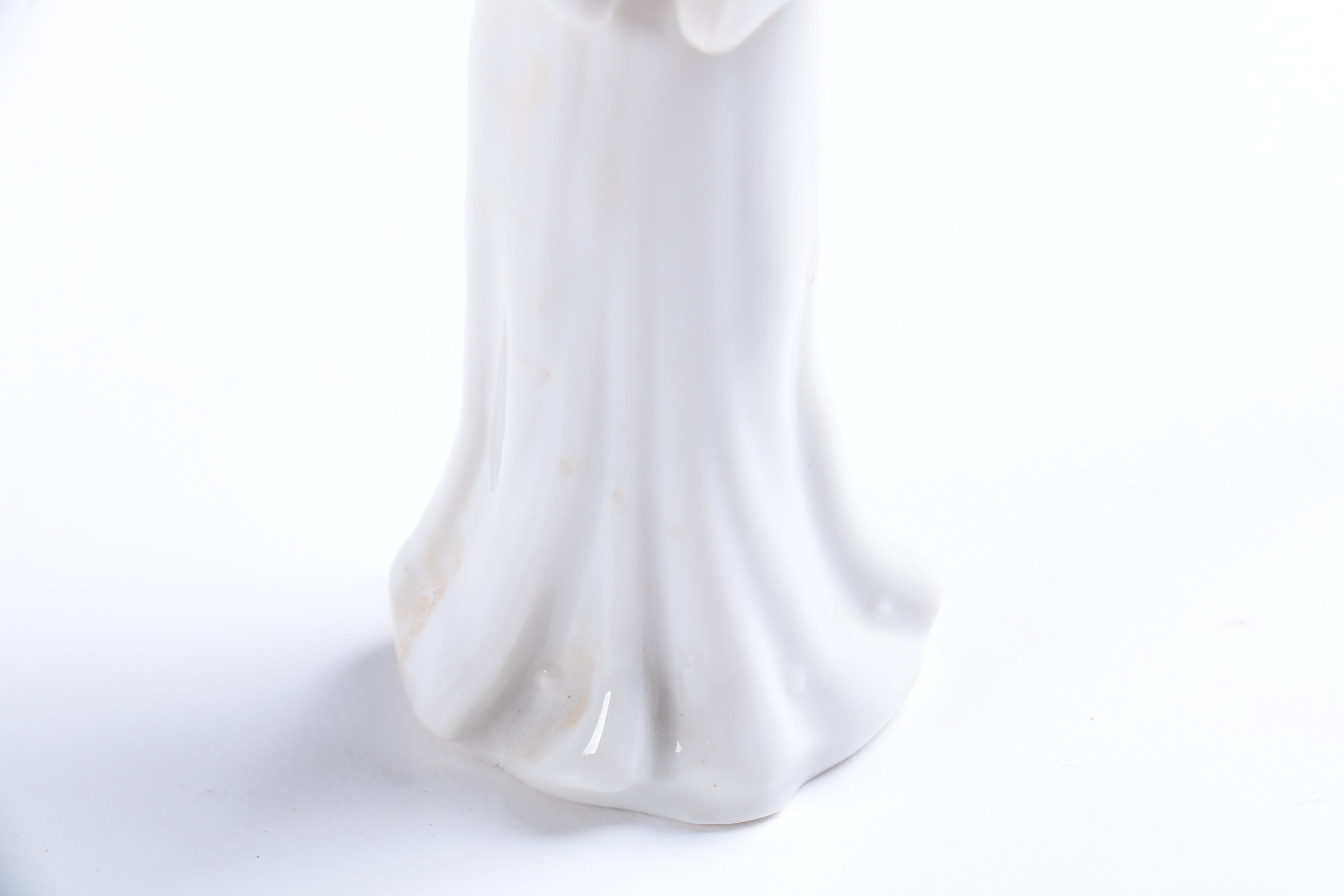 Collection of Eight Dresden Angel Figurines