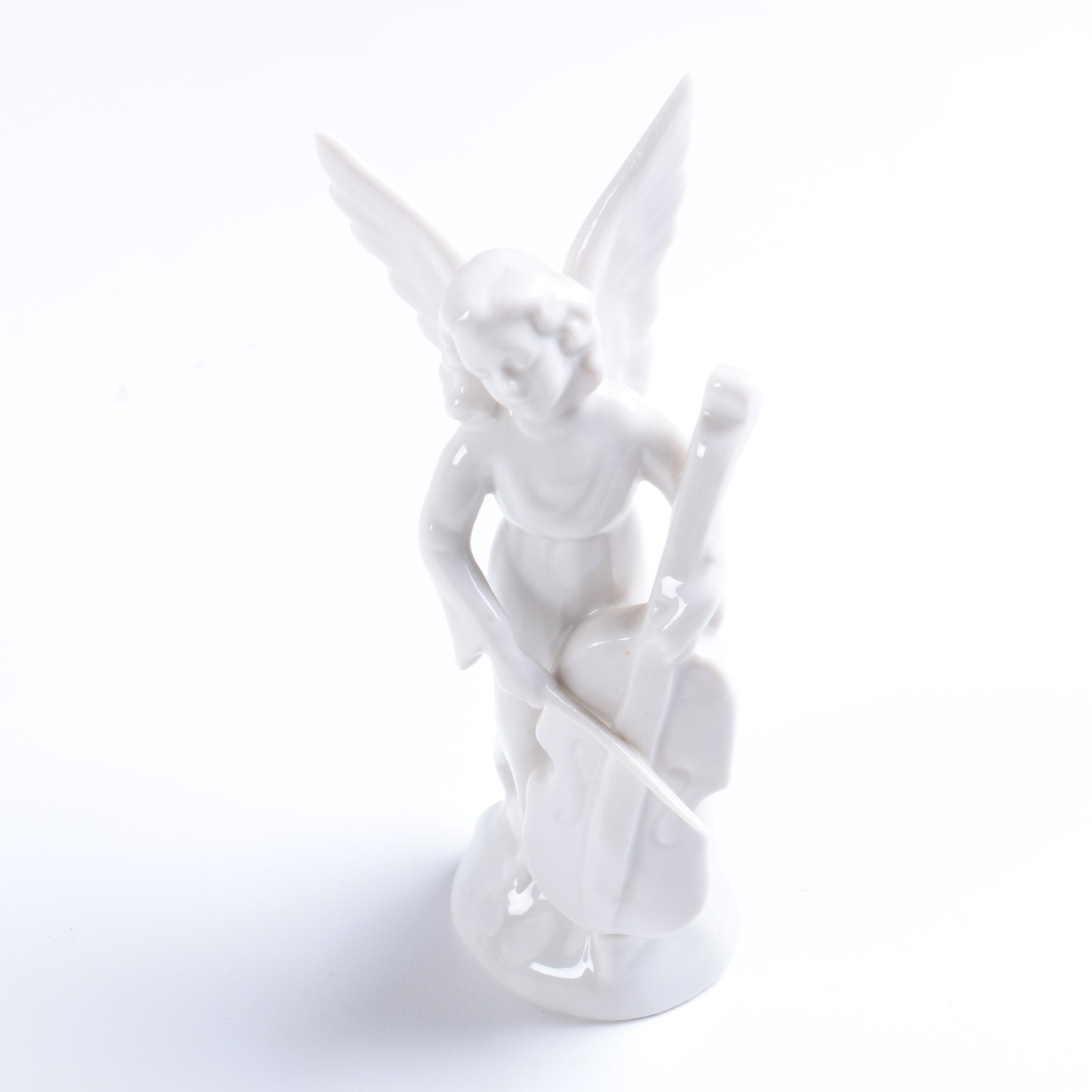 Collection of Eight Dresden Angel Figurines