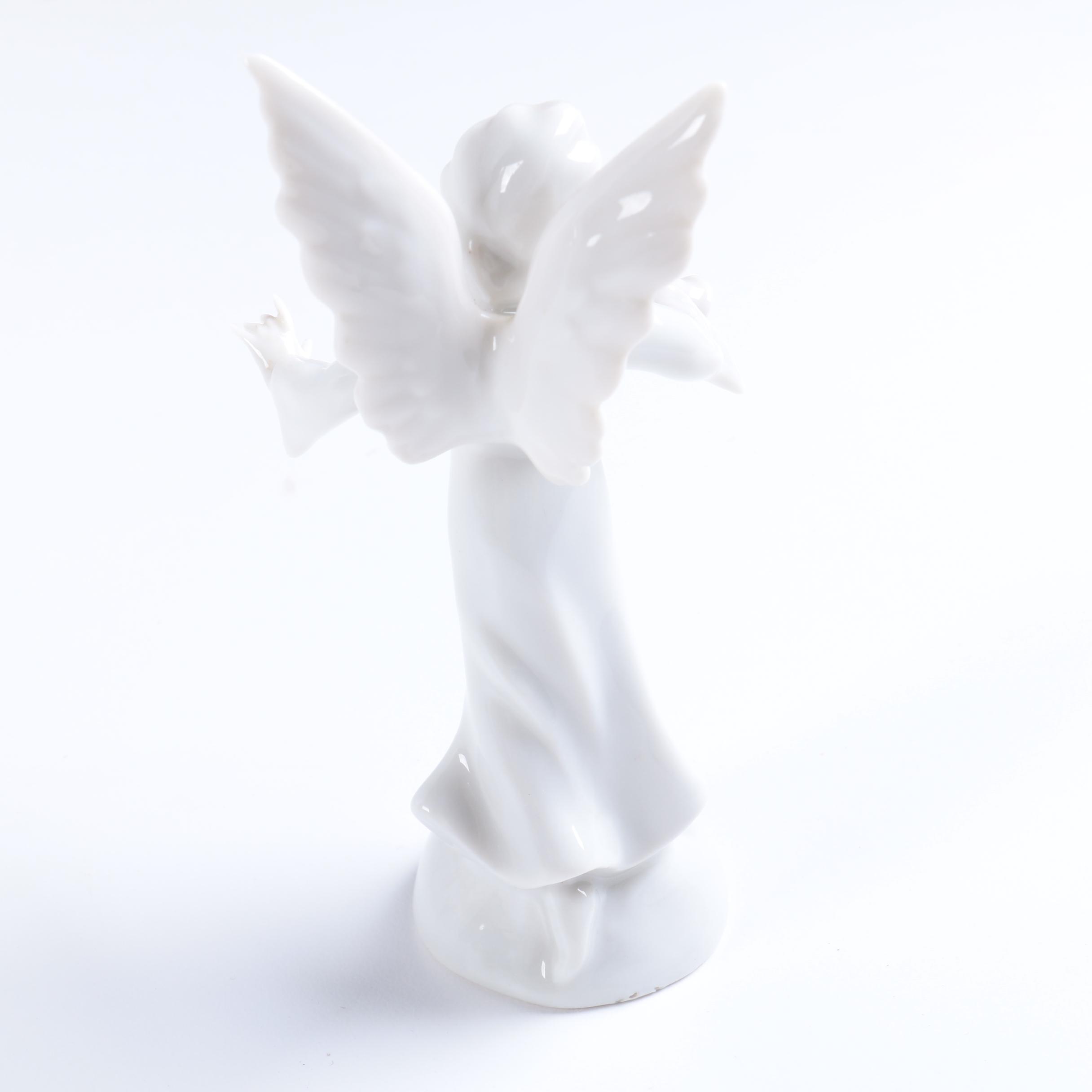 Collection of Eight Dresden Angel Figurines