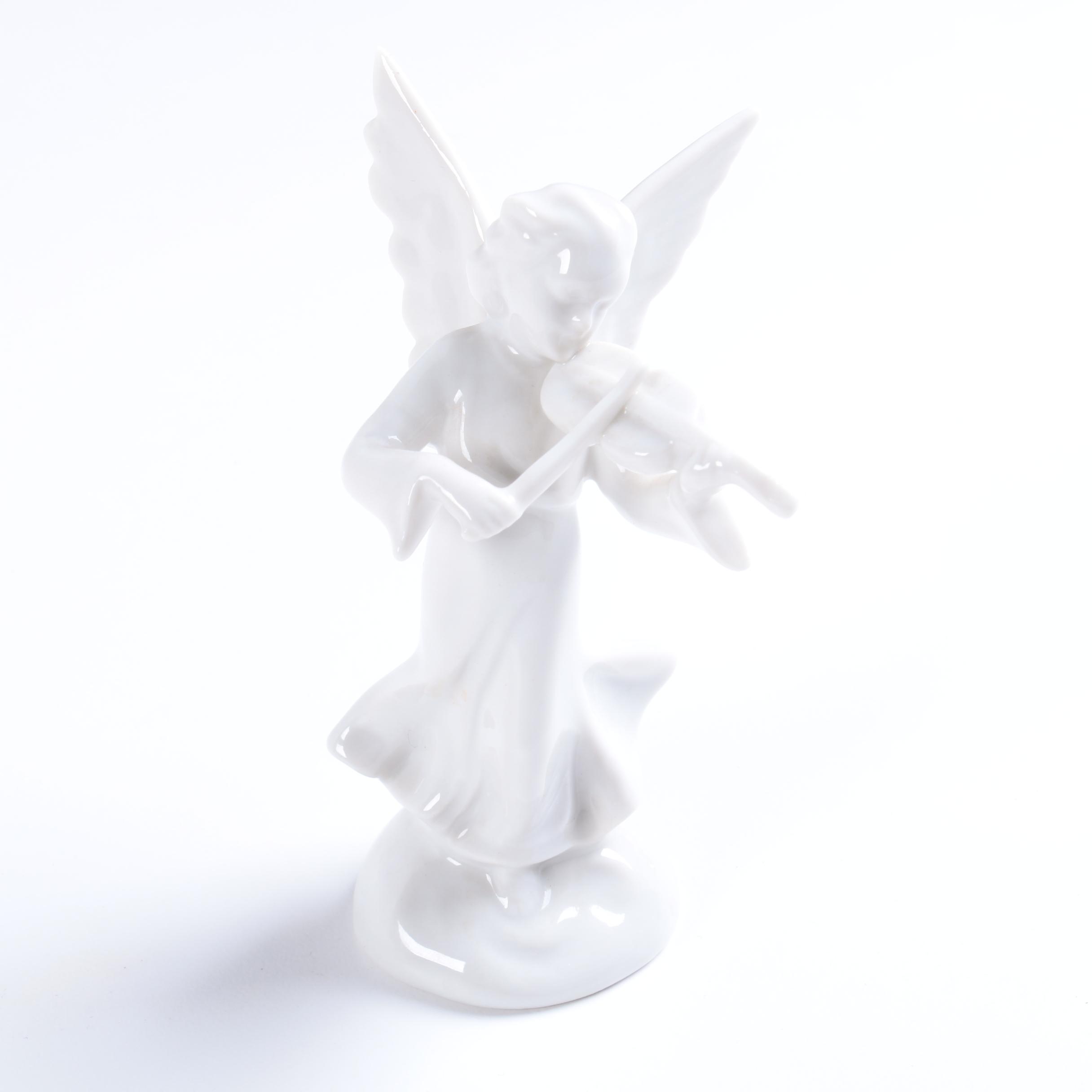 Collection of Eight Dresden Angel Figurines