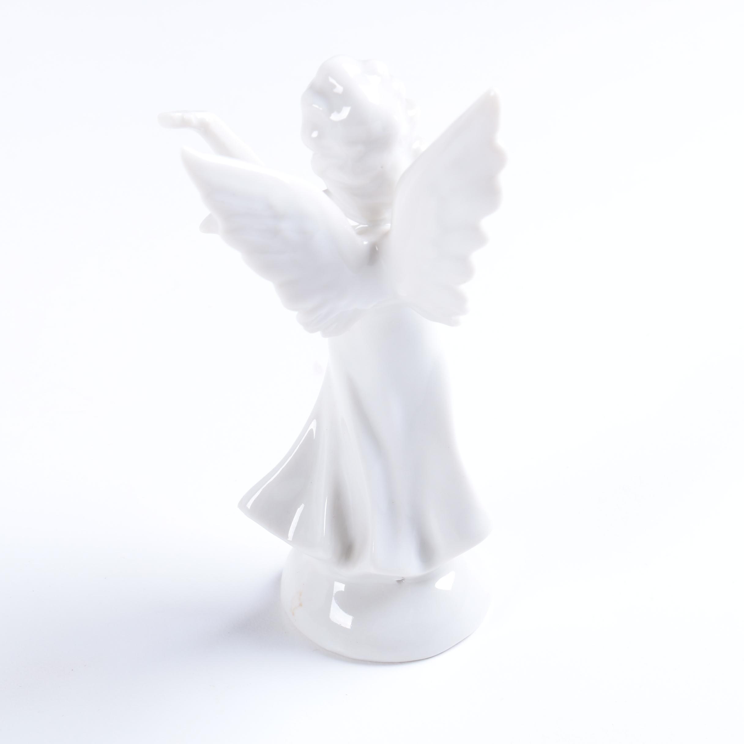 Collection of Eight Dresden Angel Figurines