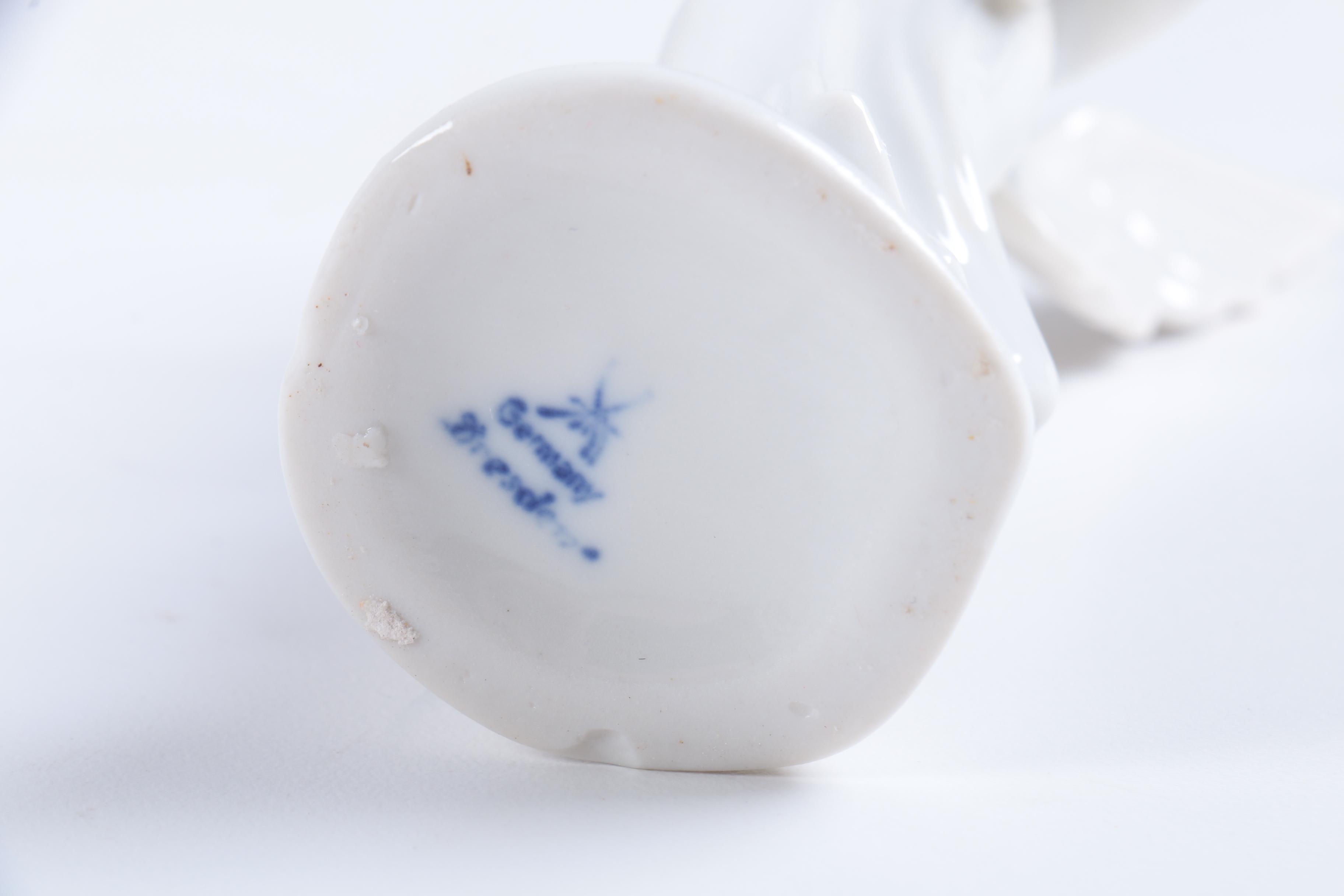 Collection of Eight Dresden Angel Figurines