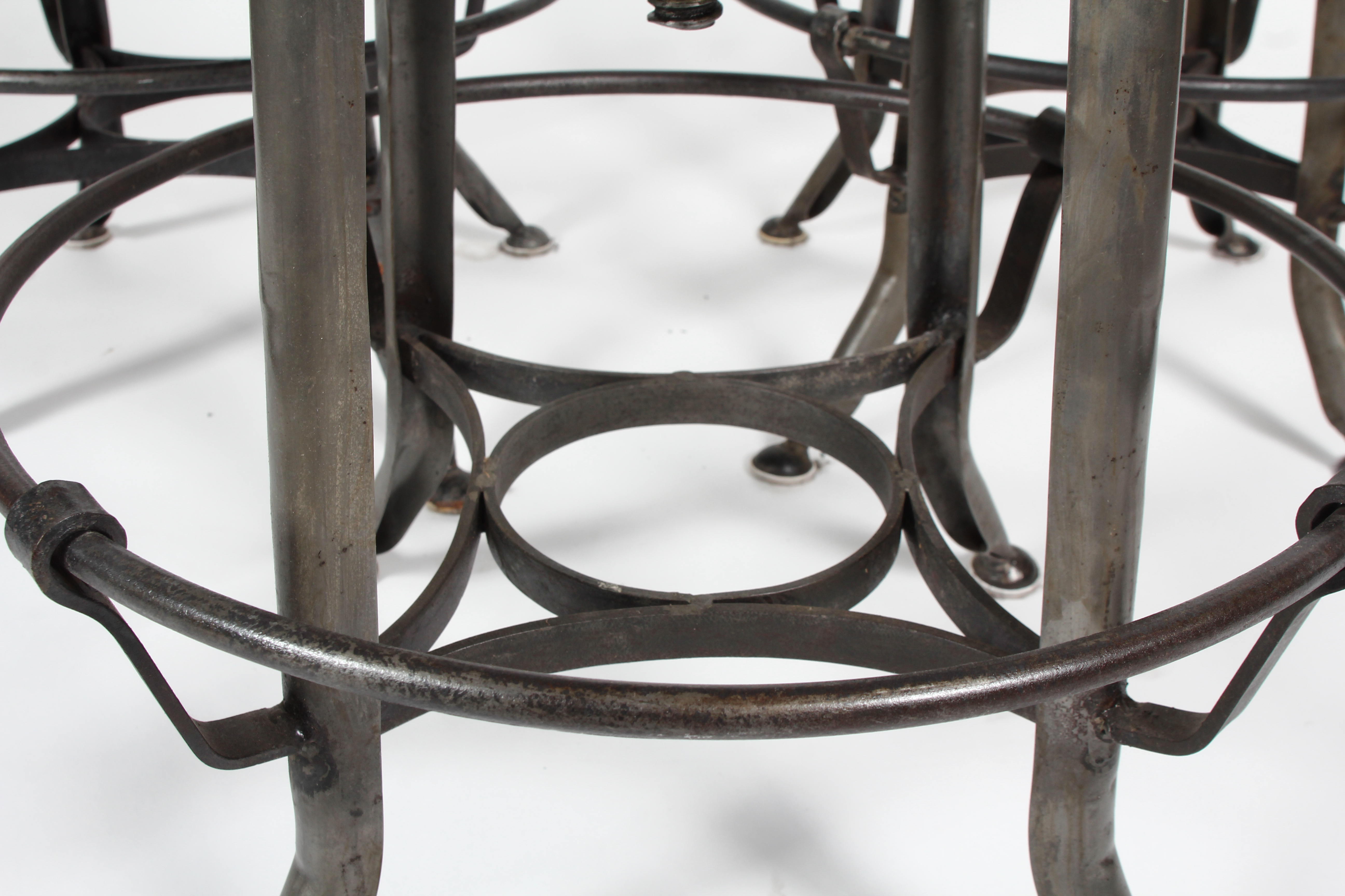 Three Steampunk Style Metal Bar Stools