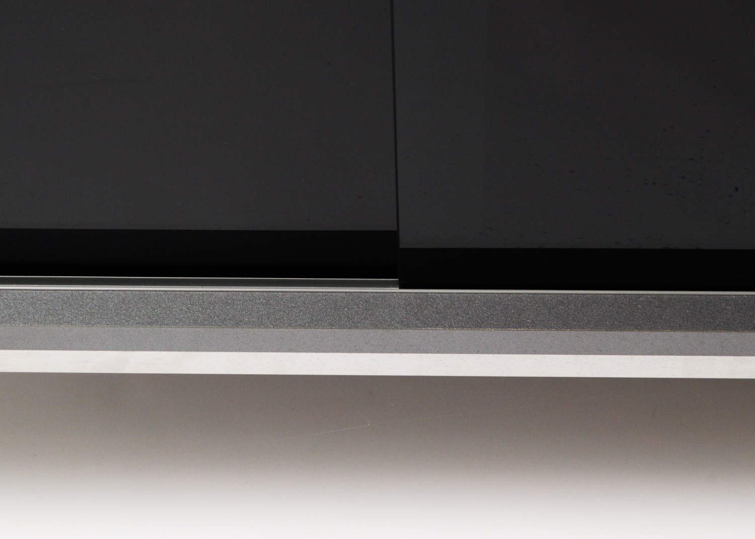 Gray Laminate and Tinted Glass Television Stand