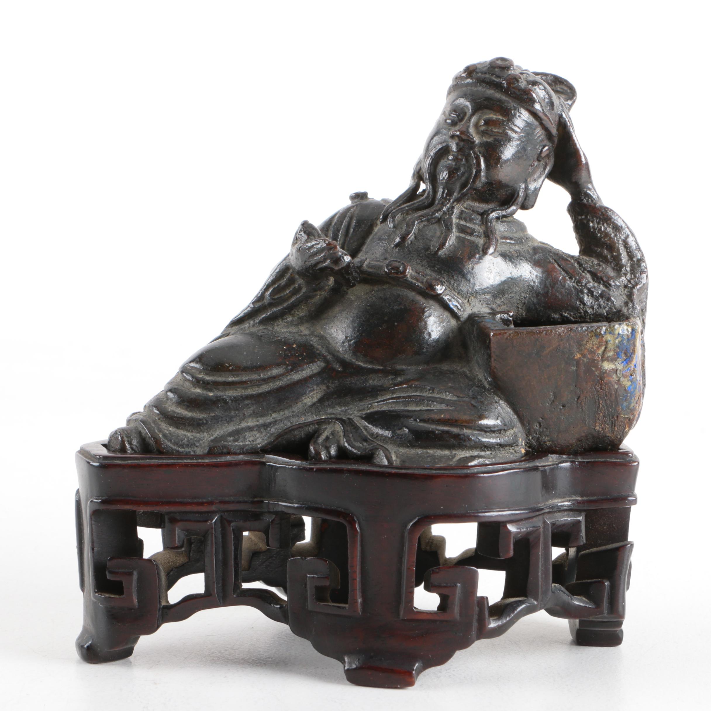 Chinese Cast Metal Reclining Figure on Wooden Base