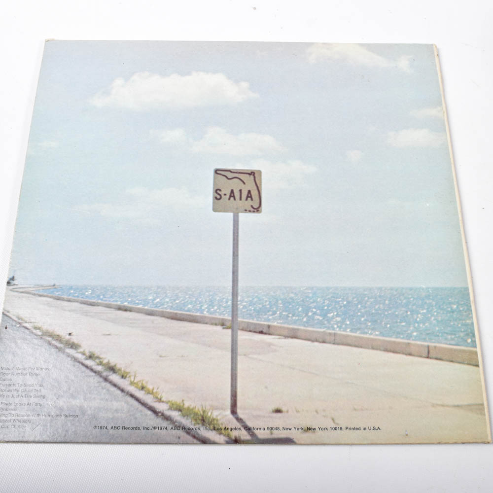 Classic Rock Record Collection Featuring Rolling Stones, The Eagles, and More