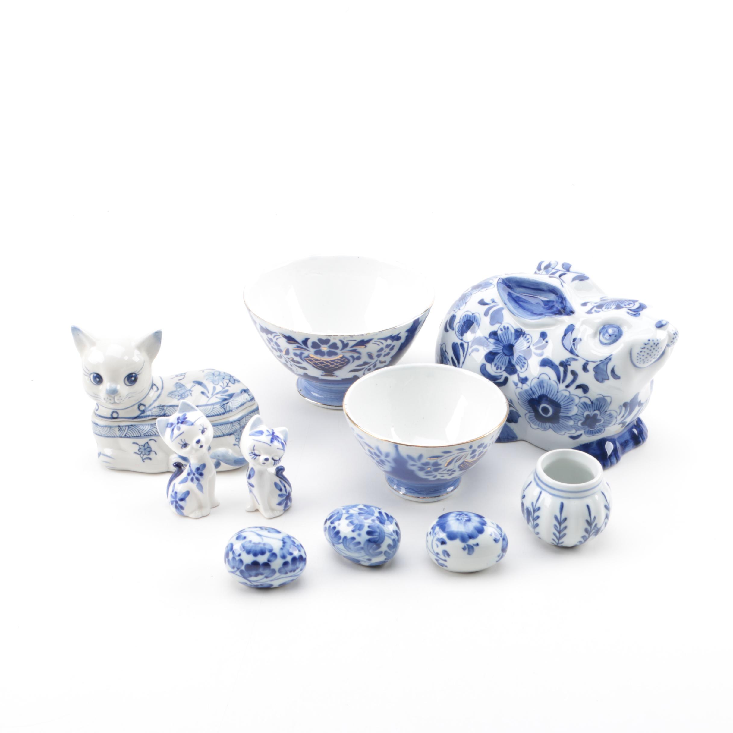 Blue and White Ceramic and Porcelain Bowls, Eggs, Figurines