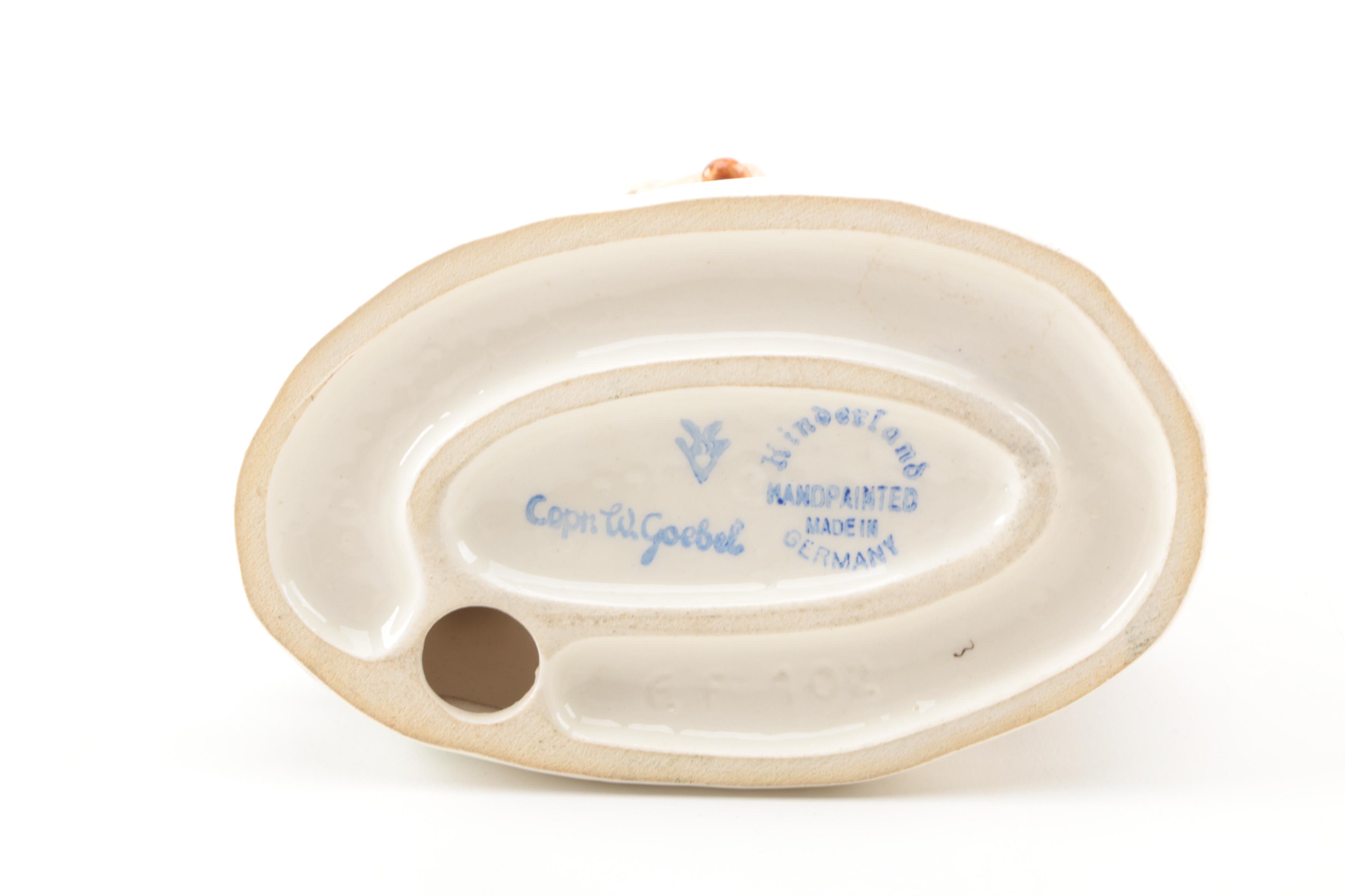 Hand-Painted Goebel Figurine of Children on Bikes