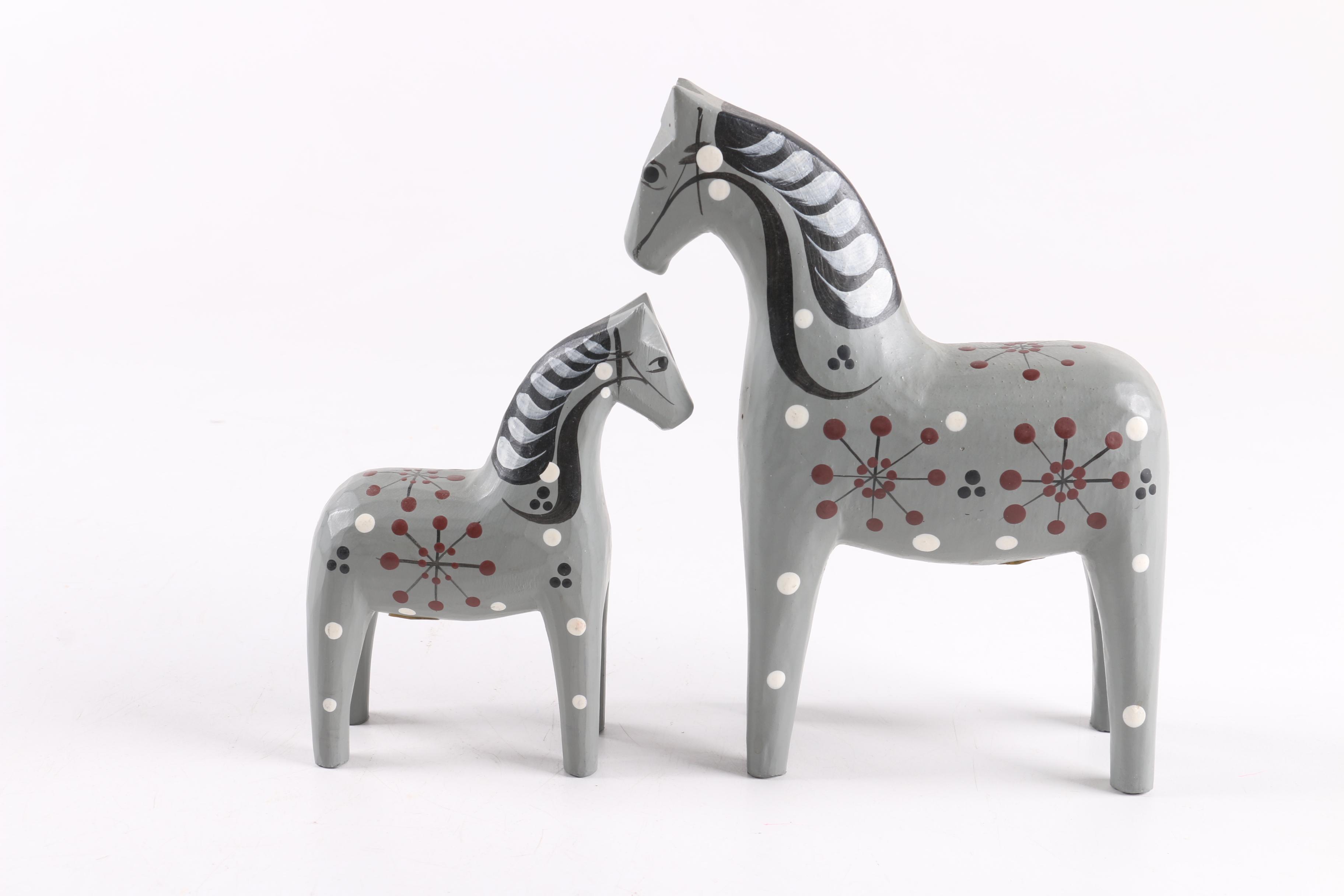 Four and Two Red "John Gudmunds" Dala Horses