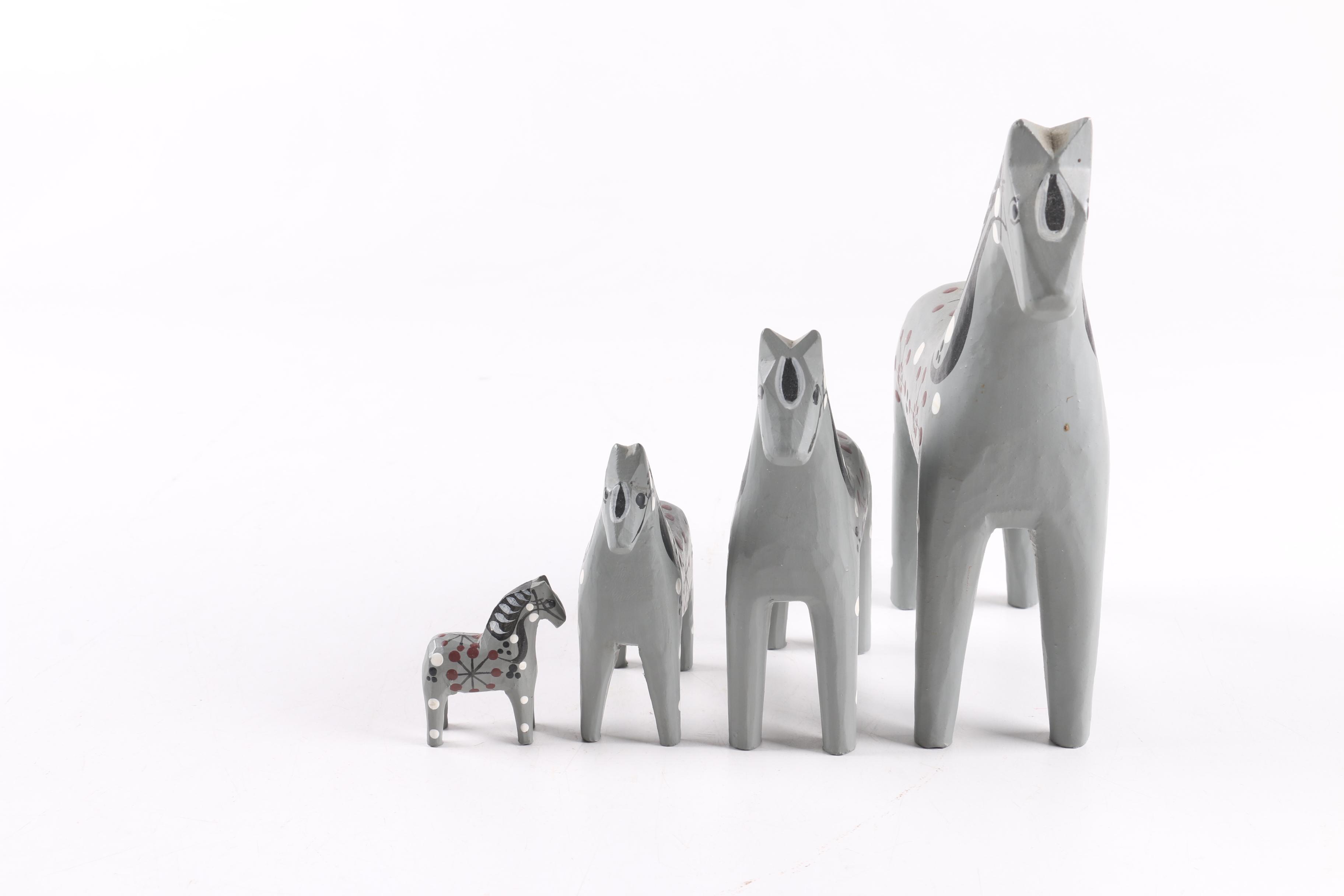 Four and Two Red "John Gudmunds" Dala Horses