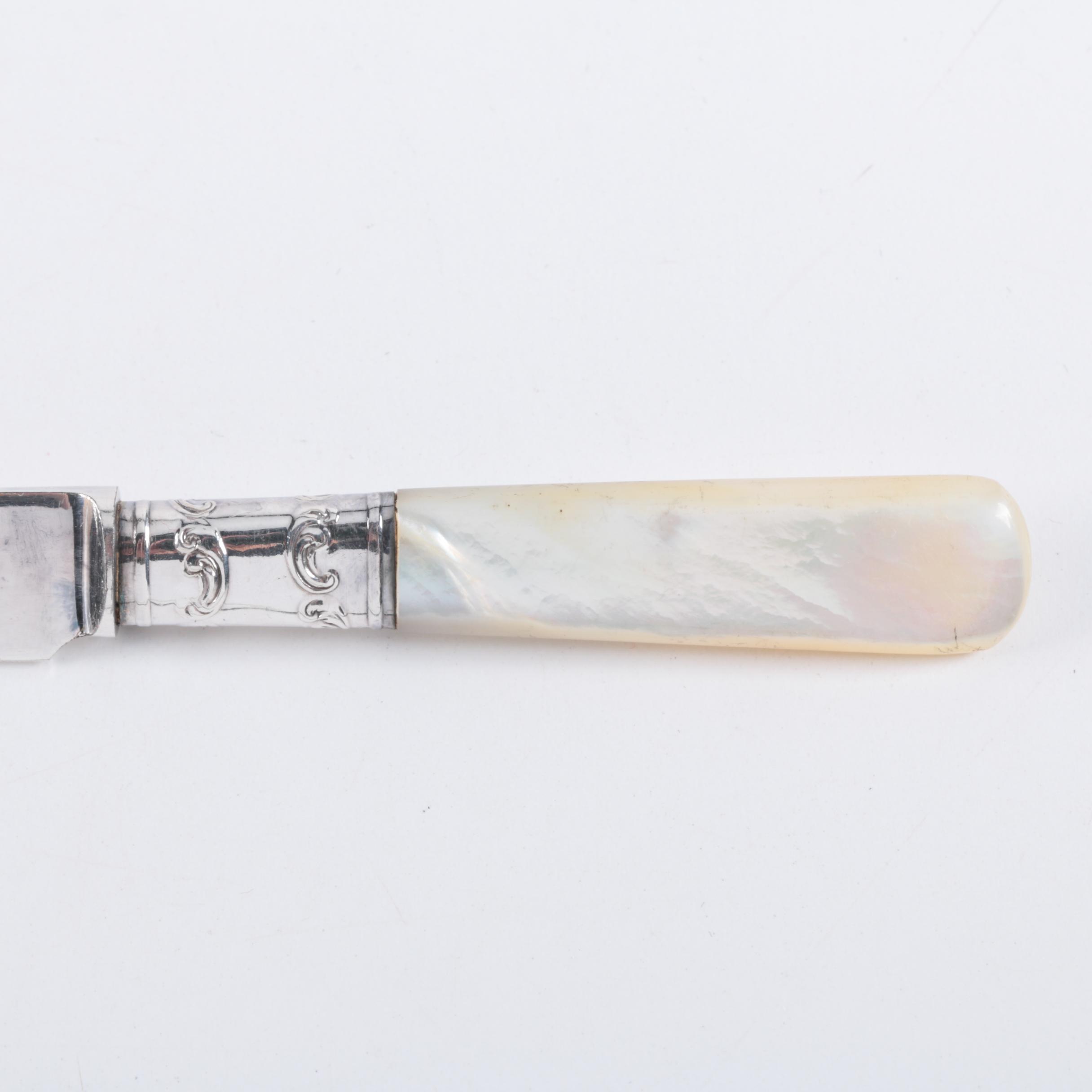 Landers, Frary & Clark Mother of Pearl Handled Knives with Sterling Bolsters