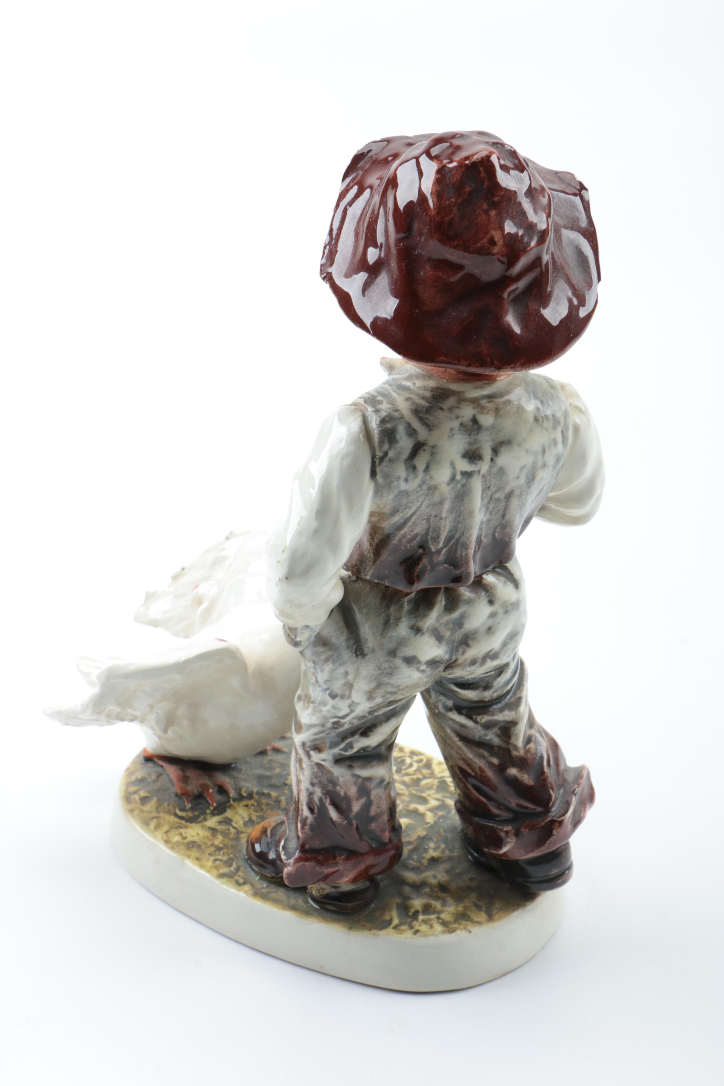 Italian Porcelain Figurine of a Boy Feeding Geese