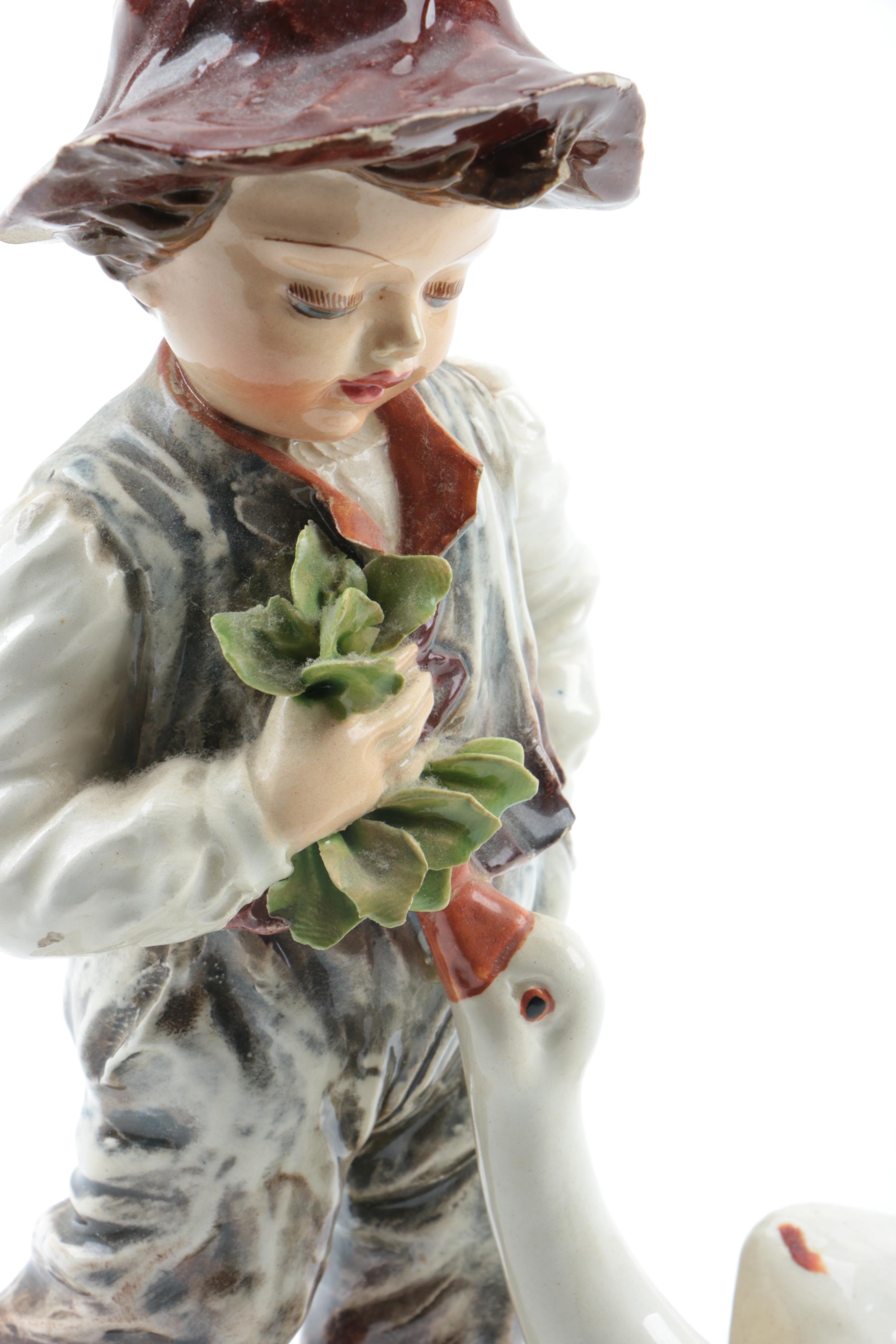 Italian Porcelain Figurine of a Boy Feeding Geese
