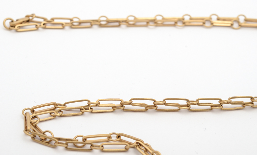 Tori Burch Gold Tone Charm Pendant Necklace