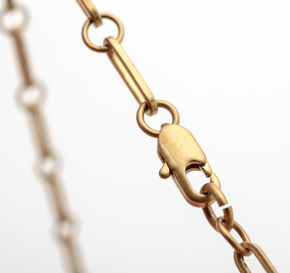 Tori Burch Gold Tone Charm Pendant Necklace