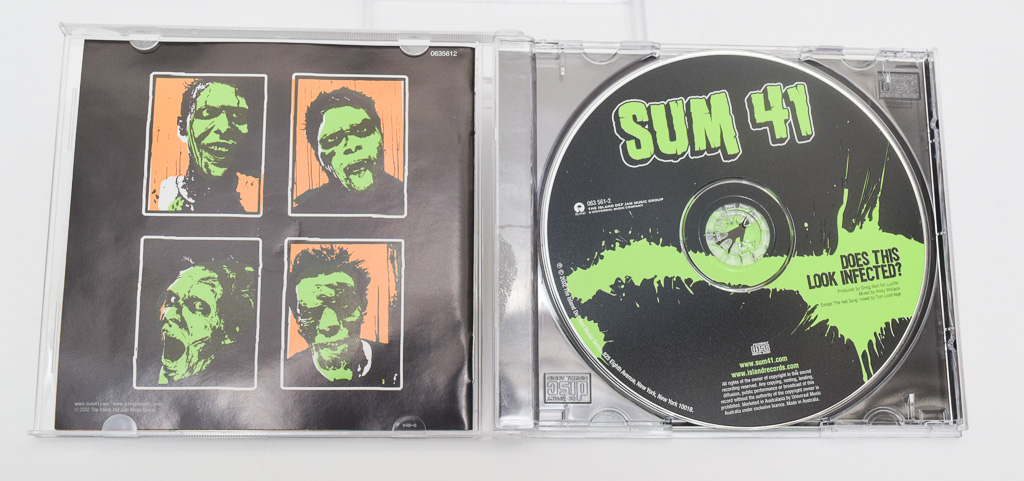 Autographed Sum 41 "Does This Look Infected?" CD
