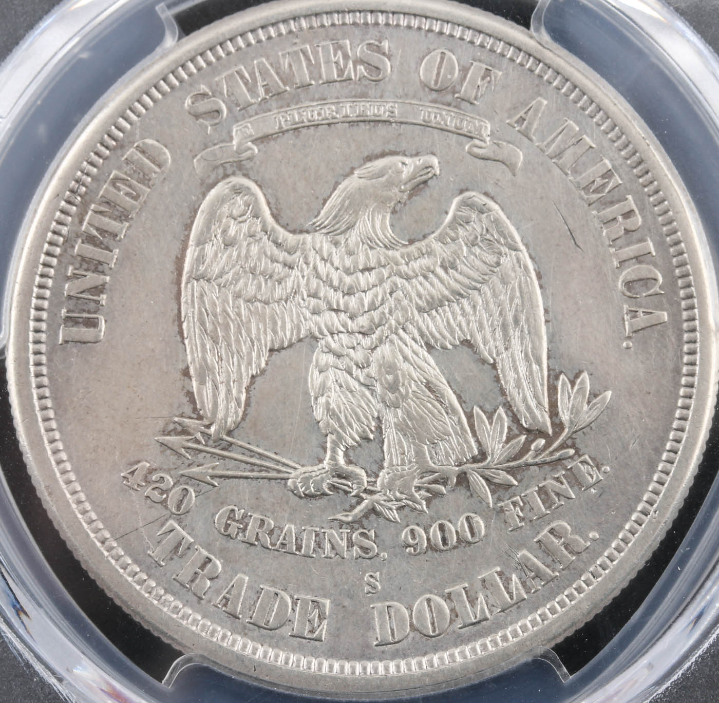 PCGS Genuine 1876 S Trade Silver Dollar