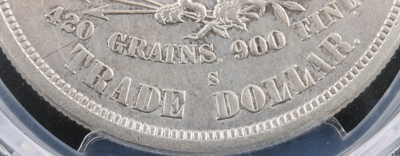 PCGS Genuine 1876 S Trade Silver Dollar