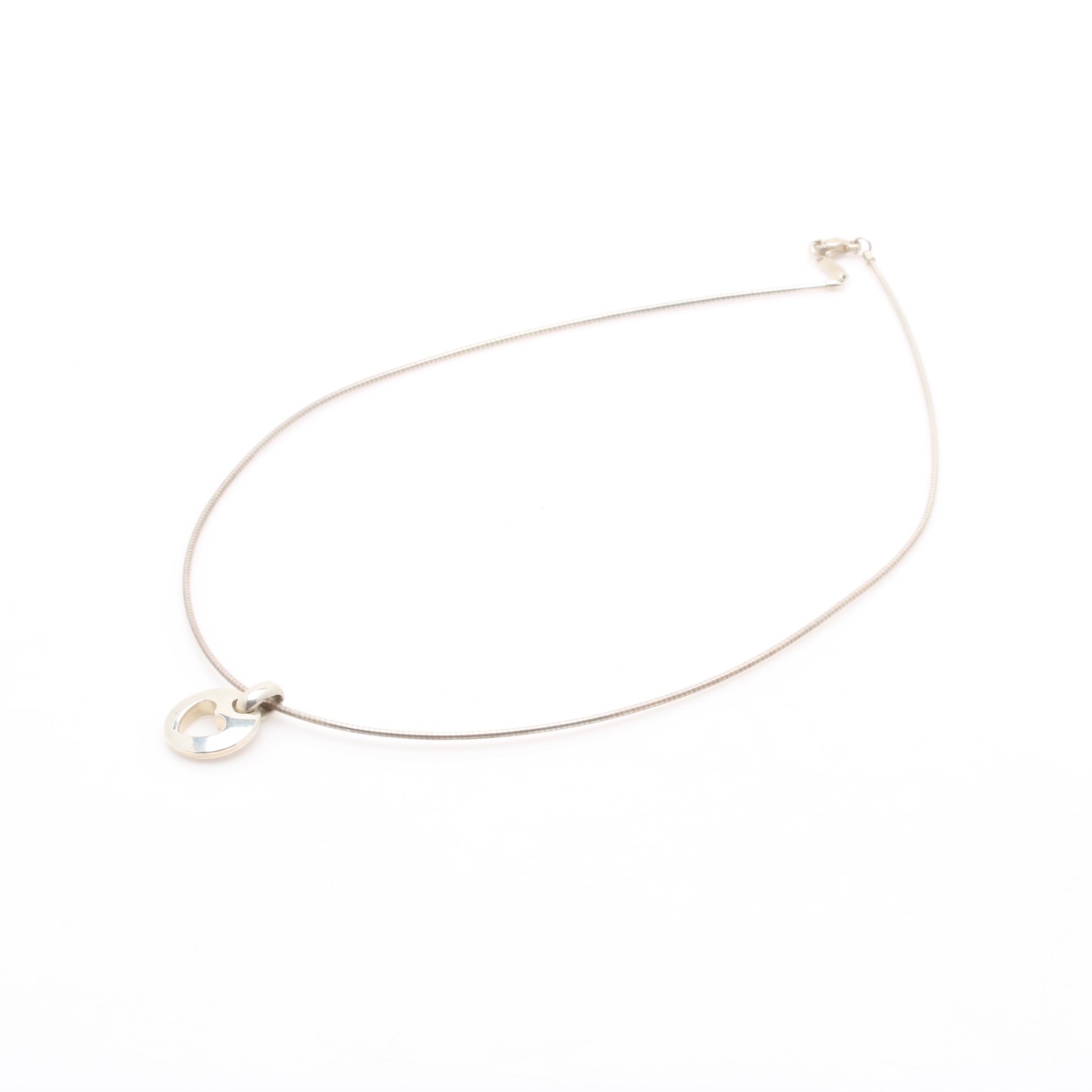 Tiffany & Co. Sterling Silver "1999" Stencil Heart Pendant Necklace