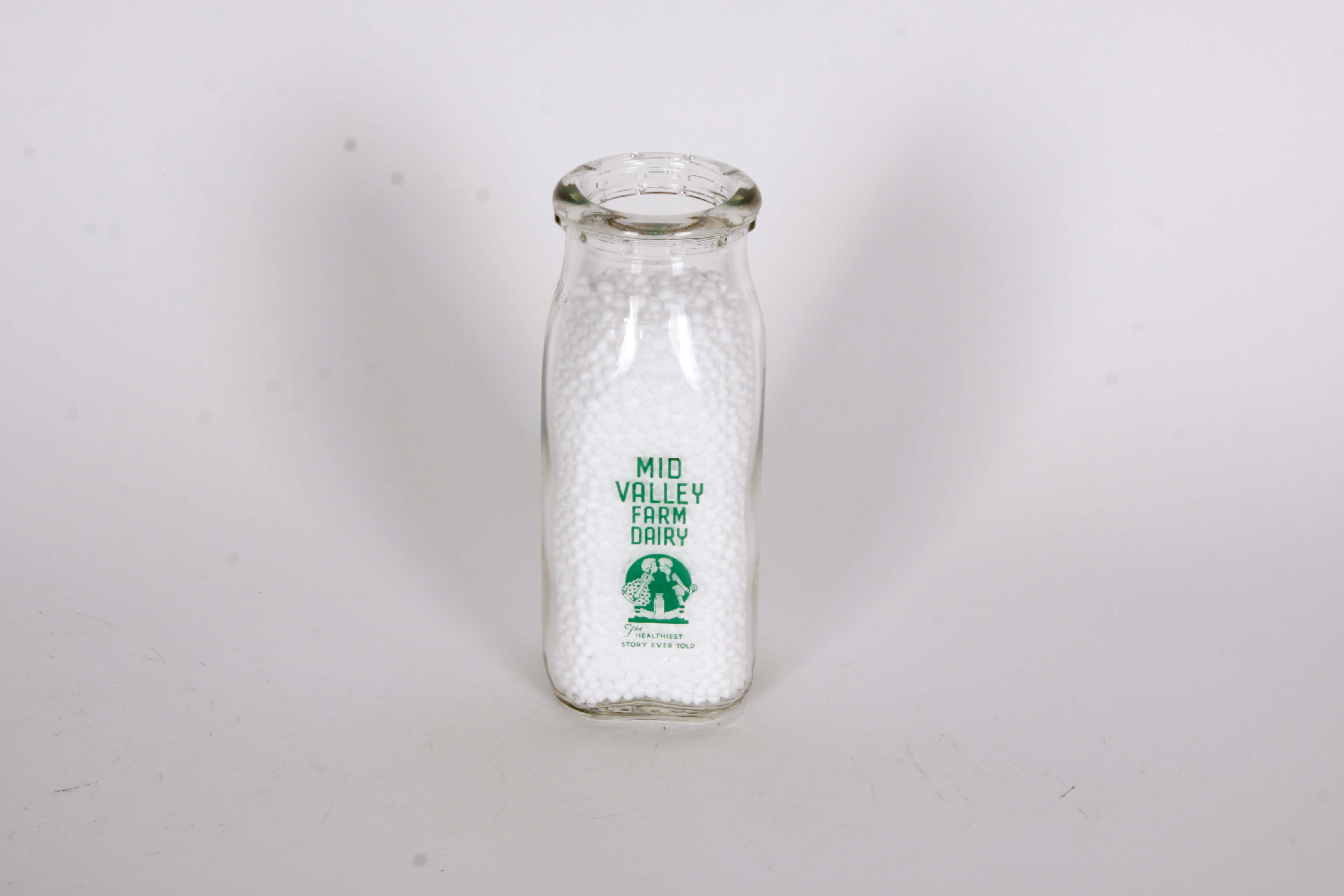 Collection of Vintage Pennsylvania Dairy Bottles and Jars II