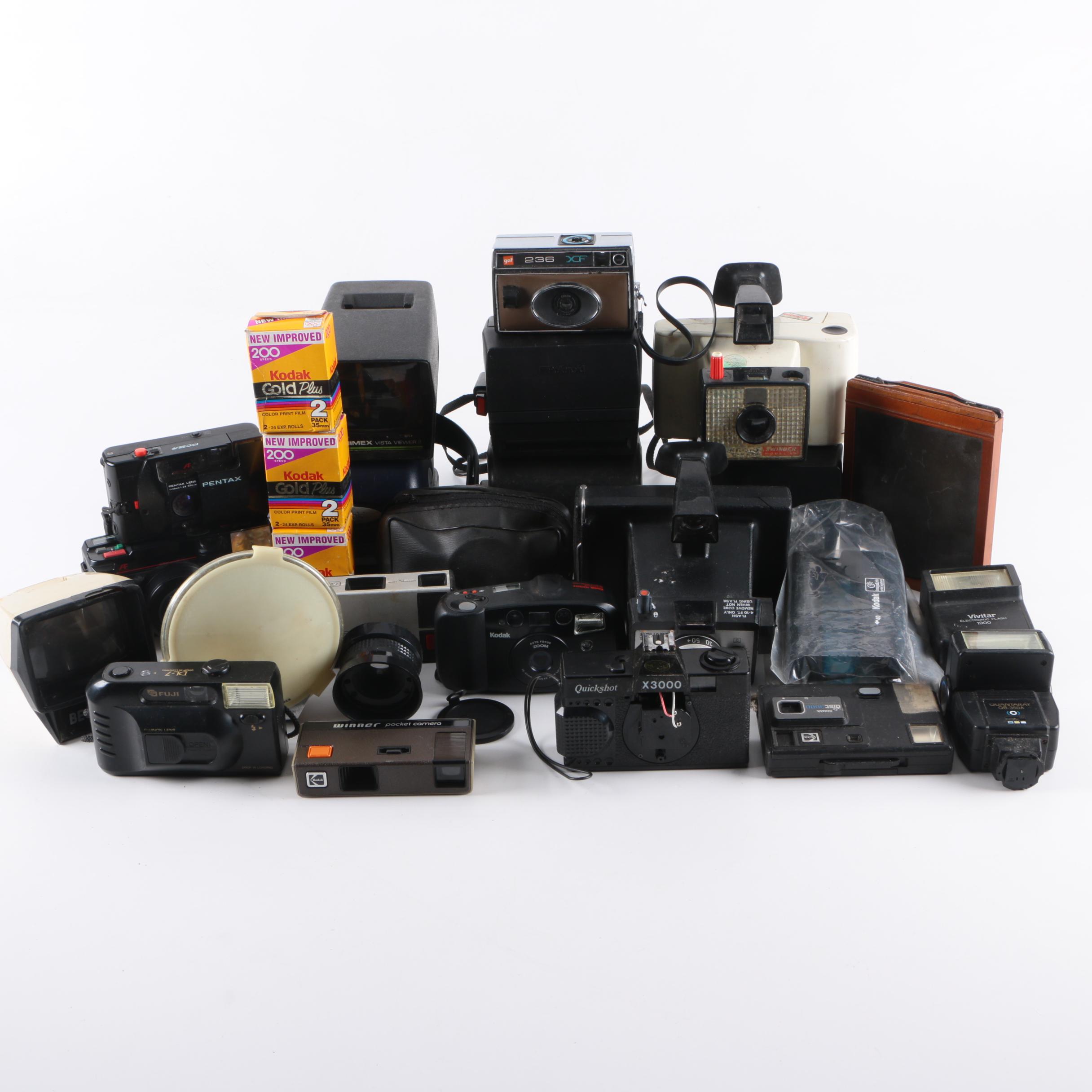 Still Cameras Including Polaroid 600, Square Shooter 2, and Swinger Model 20