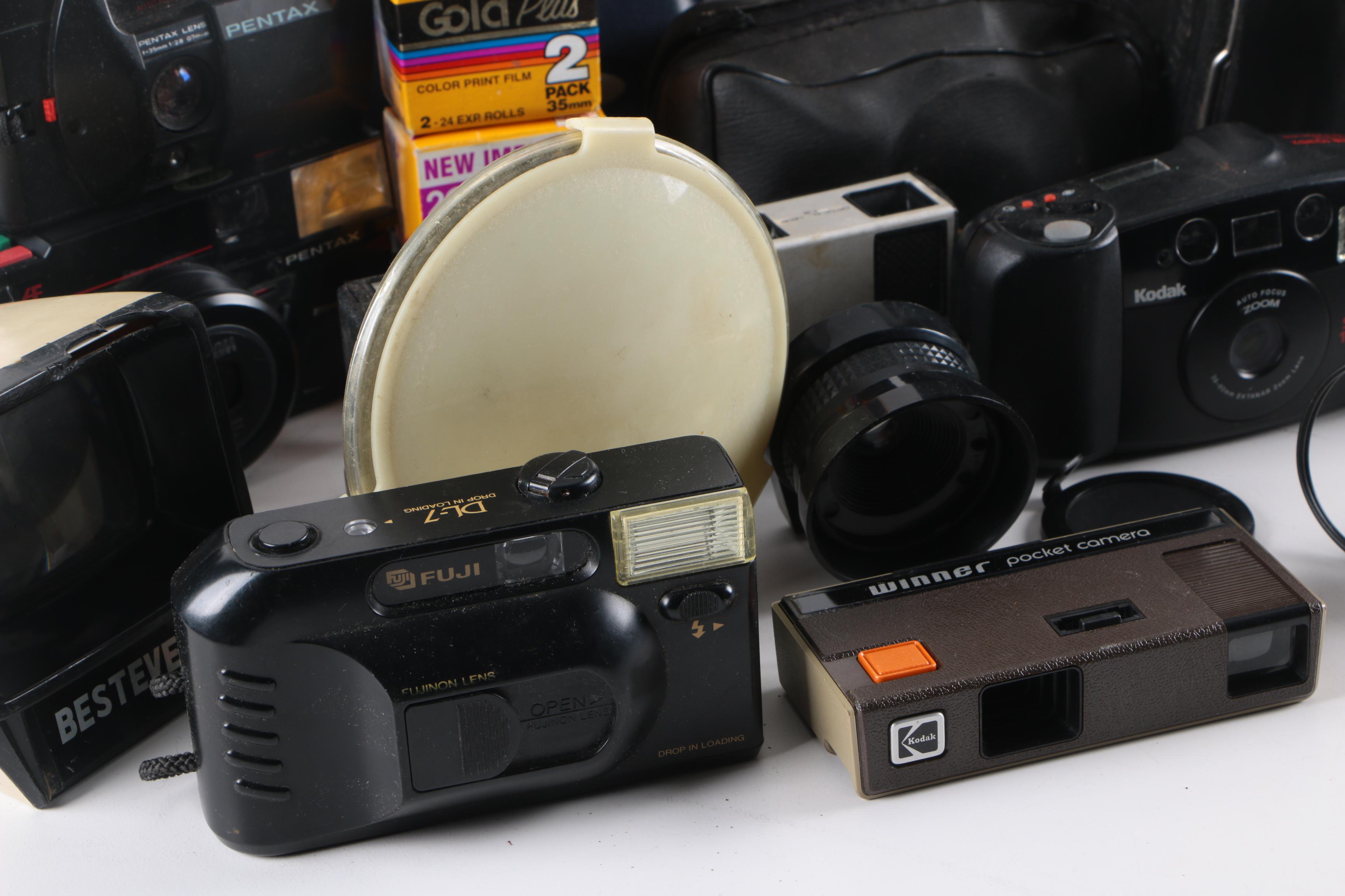 Still Cameras Including Polaroid 600, Square Shooter 2, and Swinger Model 20