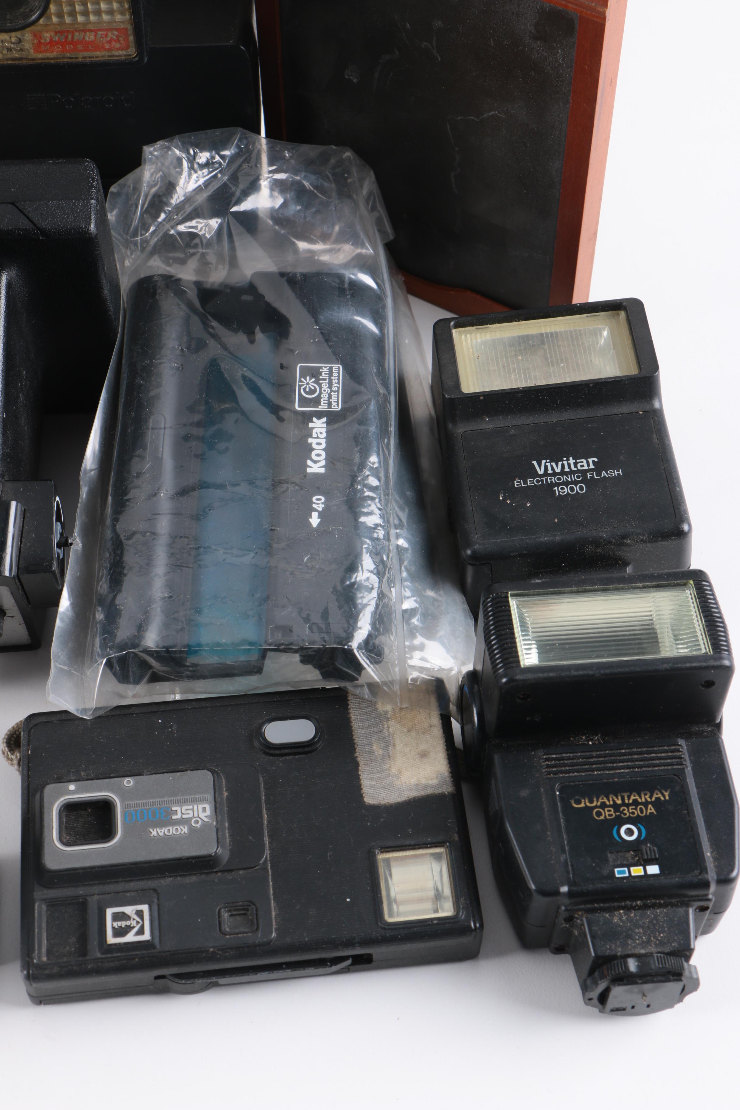 Still Cameras Including Polaroid 600, Square Shooter 2, and Swinger Model 20