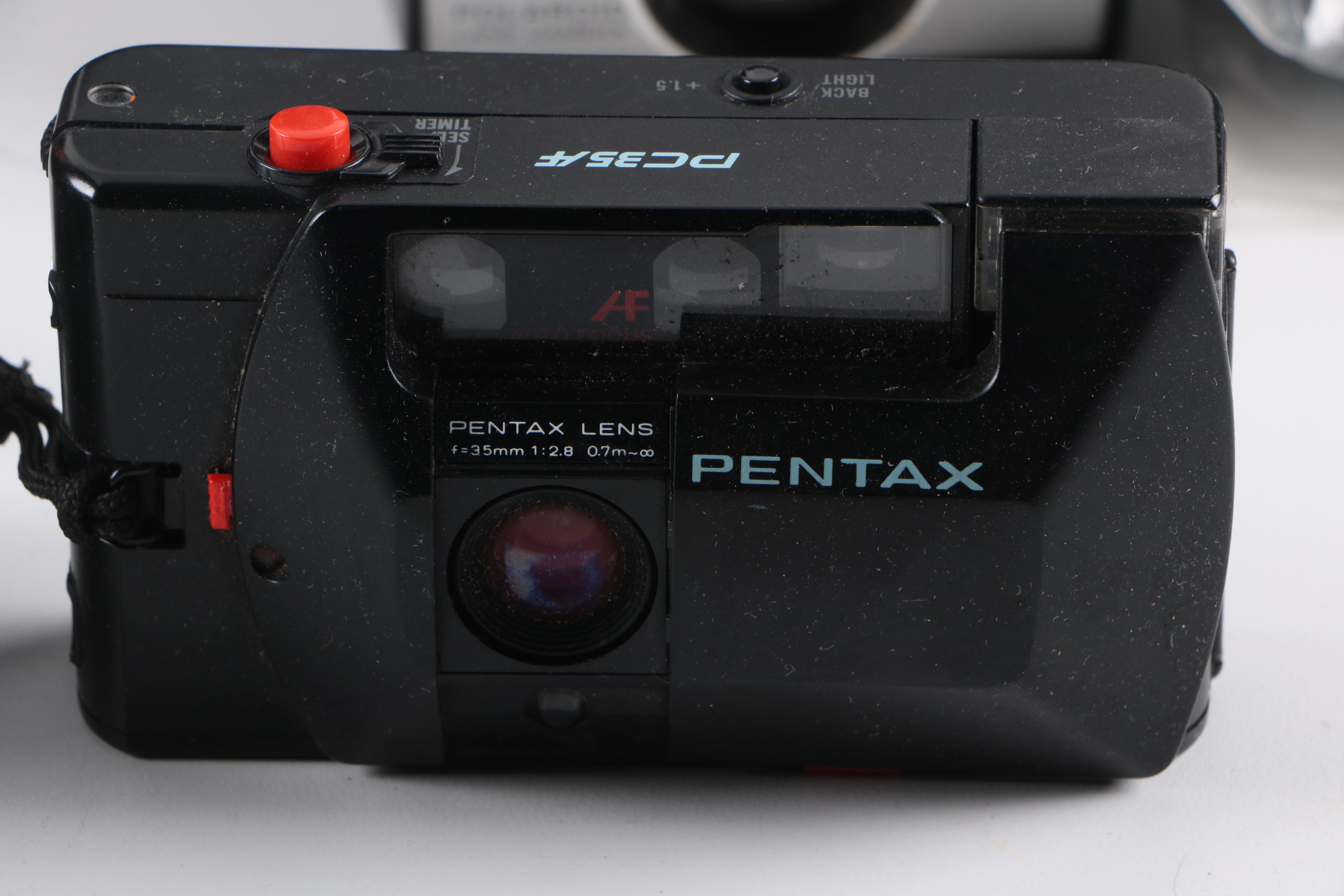 Still Cameras Including Polaroid 600, Square Shooter 2, and Swinger Model 20