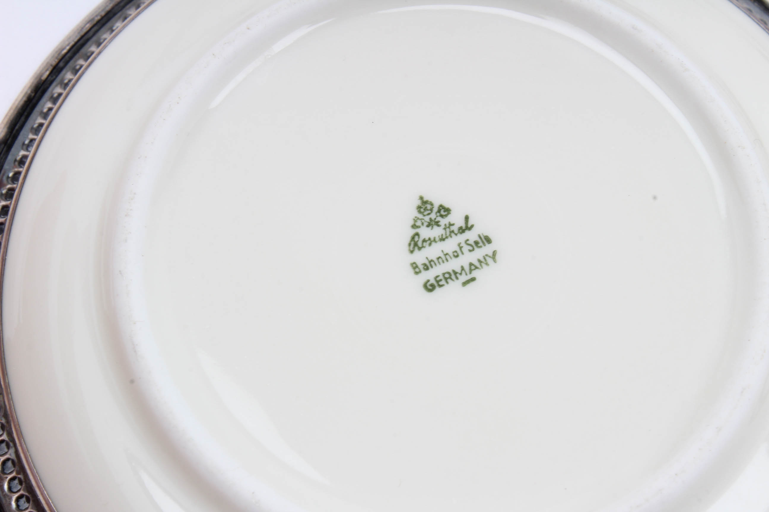 Sterling Silver Rimmed Rosenthal Porcelain Plates and Kirk & Matz Knife