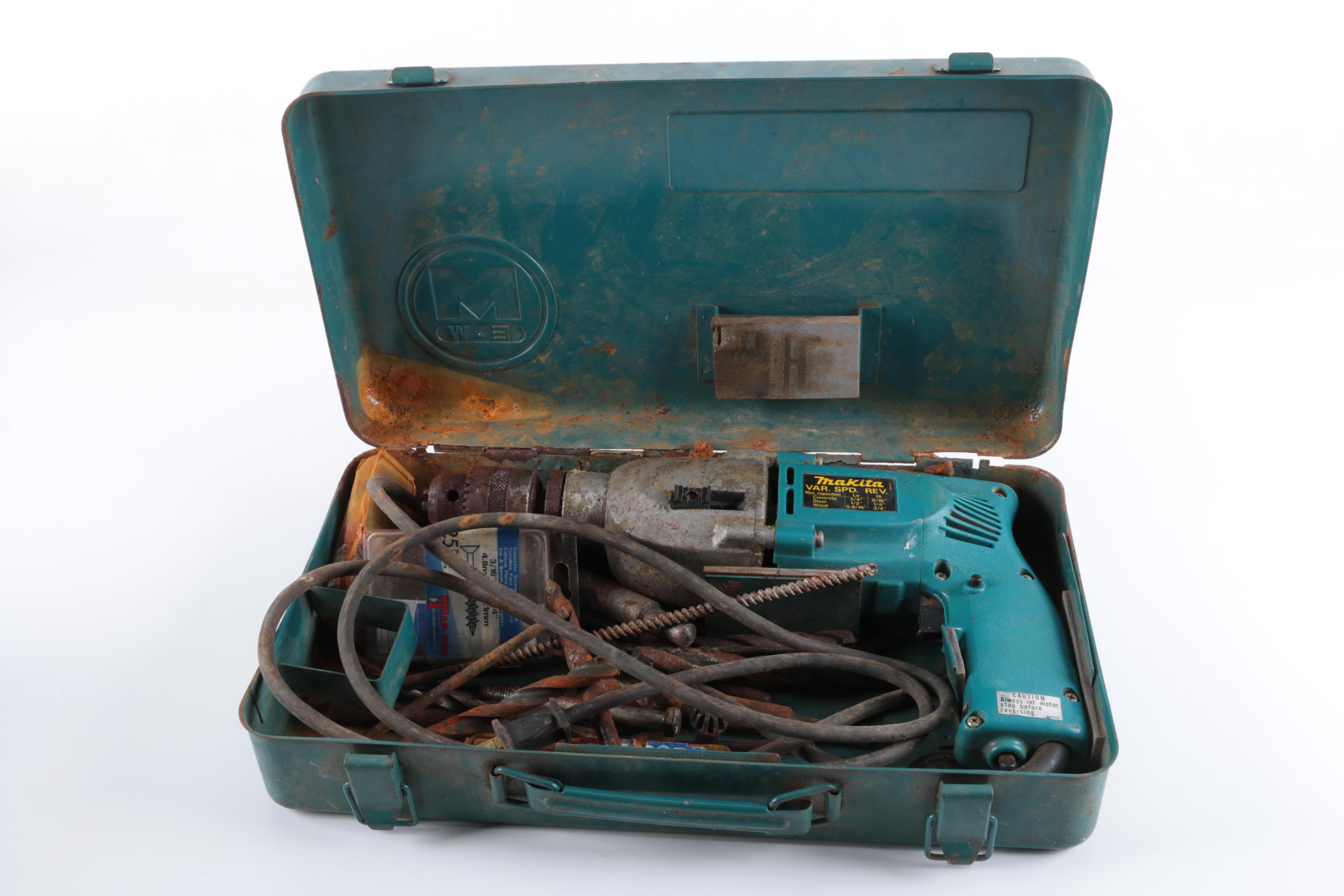Makita Hammer Drill and Electric 1/4 Sheet Finishing Sander