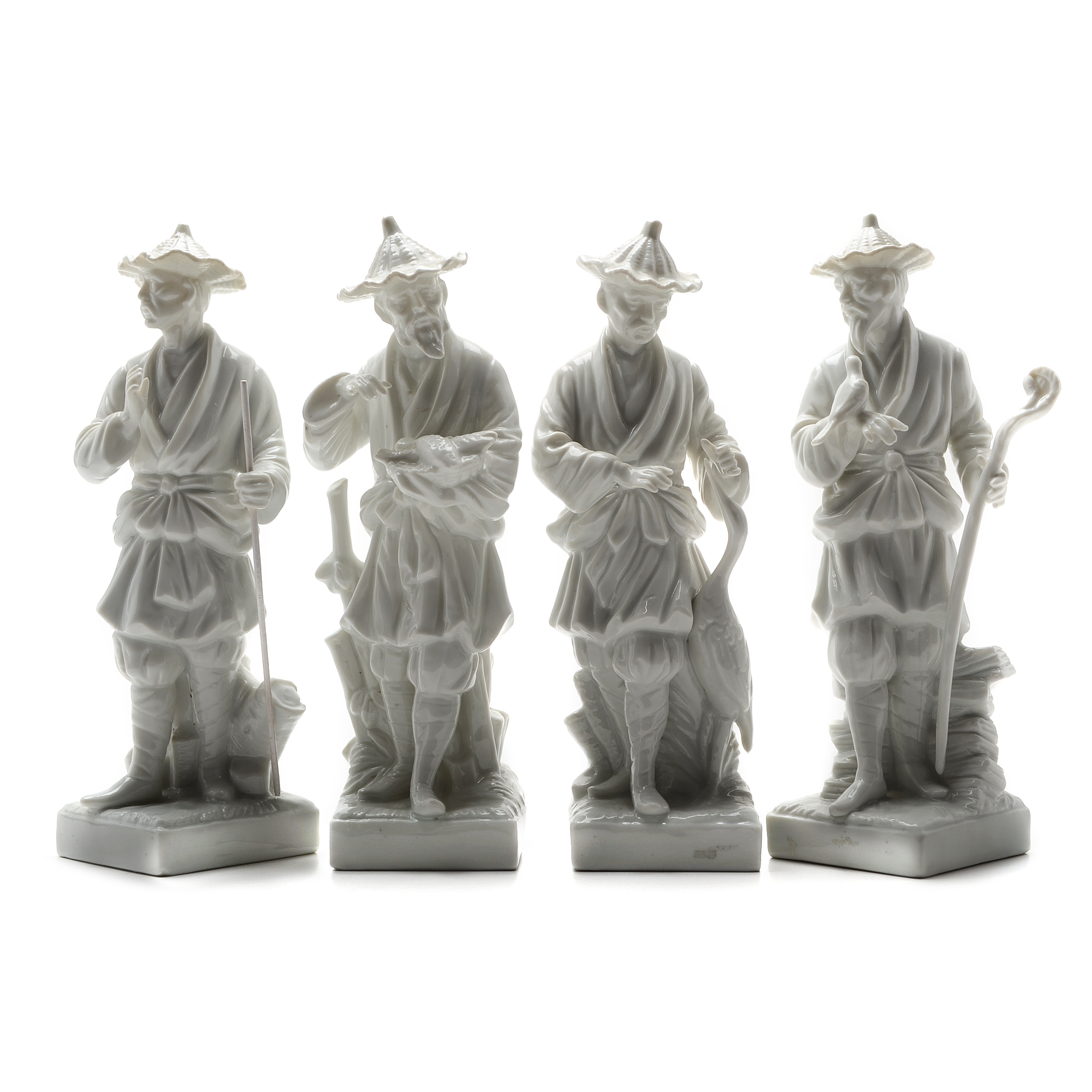 Four "Fitz and Floyd" White Porcelain Chinese Figures