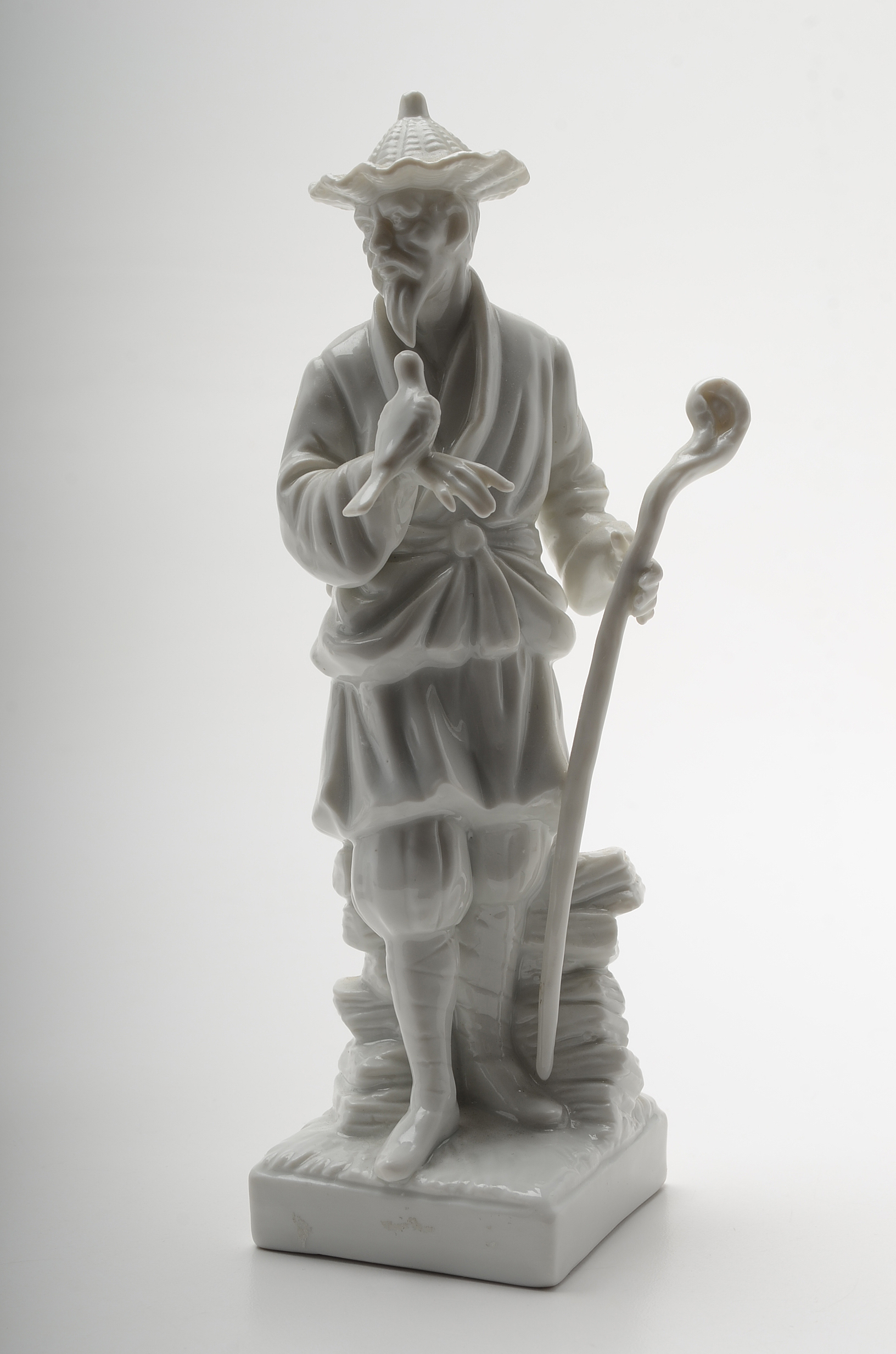 Four "Fitz and Floyd" White Porcelain Chinese Figures